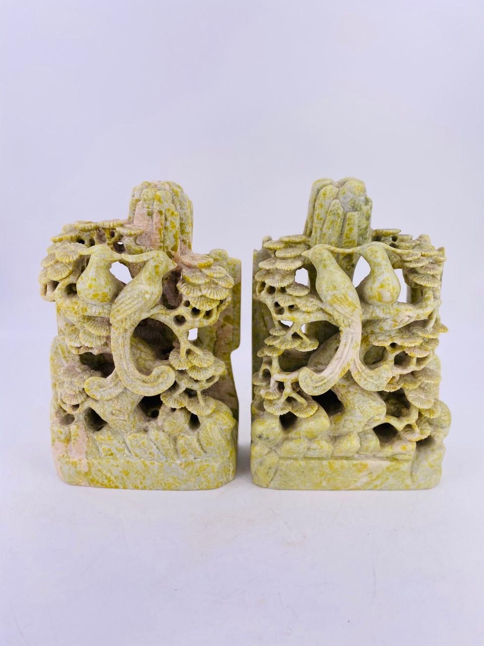 Finely carved vintage soapstone bookends. Figures of pheasants beautifully and gracefully carved in these bookends present imagery that moves with the eyes as the Fine detail is observed. Pheasants have been used symbolically in ancient Chinese