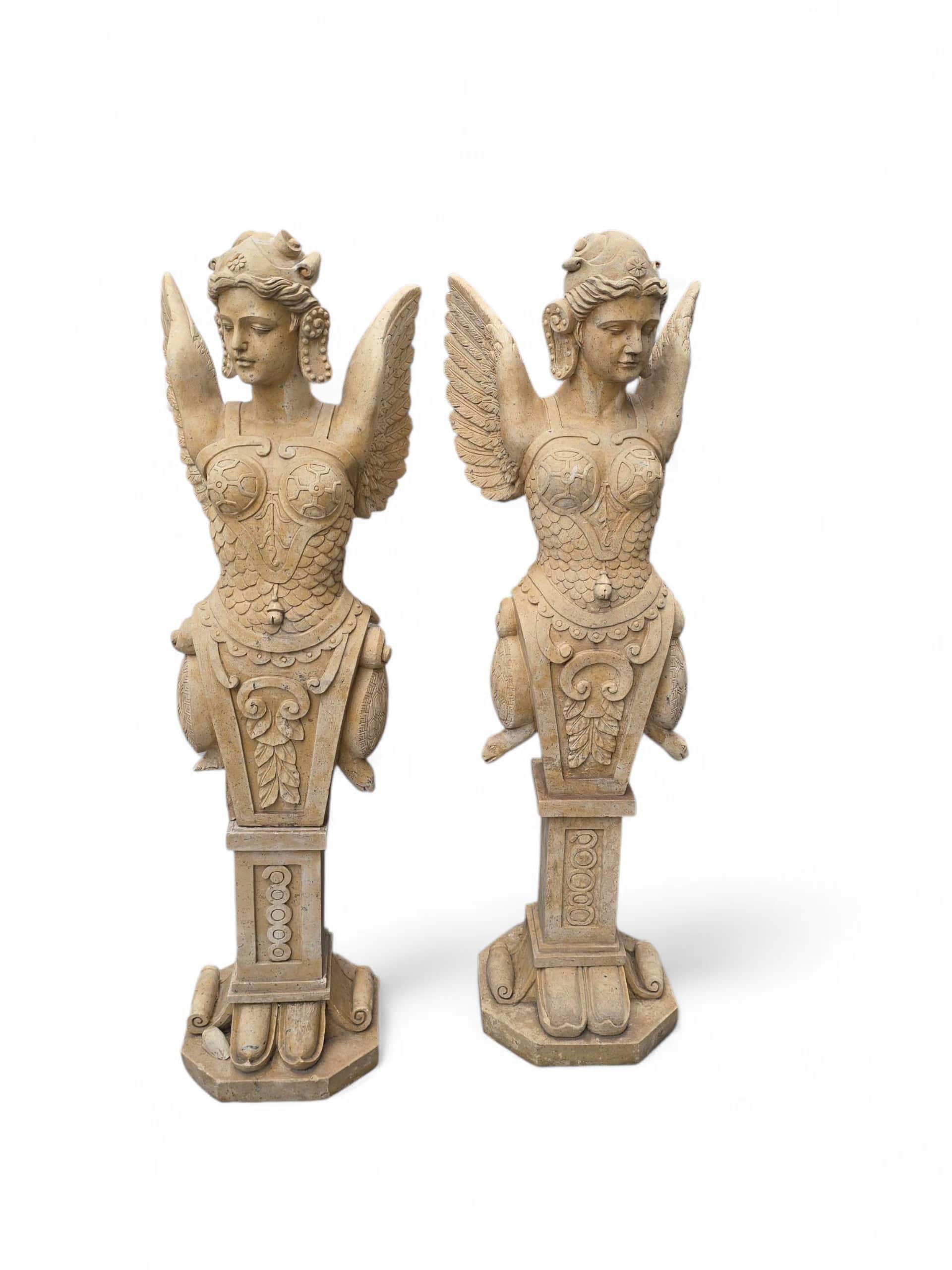 Elegant pair of allegorical winged figures, hand-carved from fine Italian marble. These graceful sculptures, likely representing virtues or mythological spirits, feature flowing drapery, serene expressions, and delicately rendered wings. Suitable