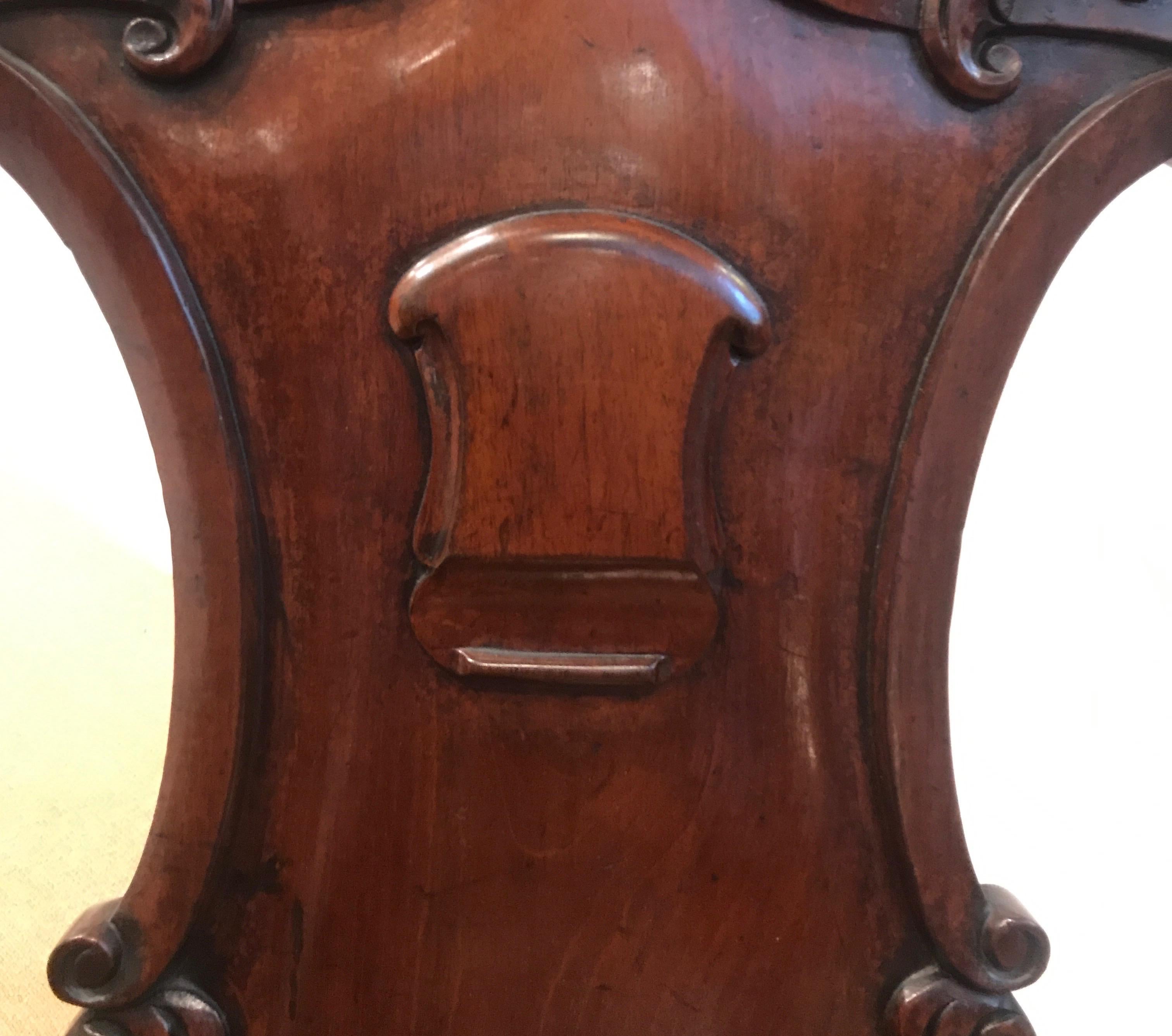 Late 19th Century Pair of Hand Carved Mahogany Armorial Hall Chairs For Sale