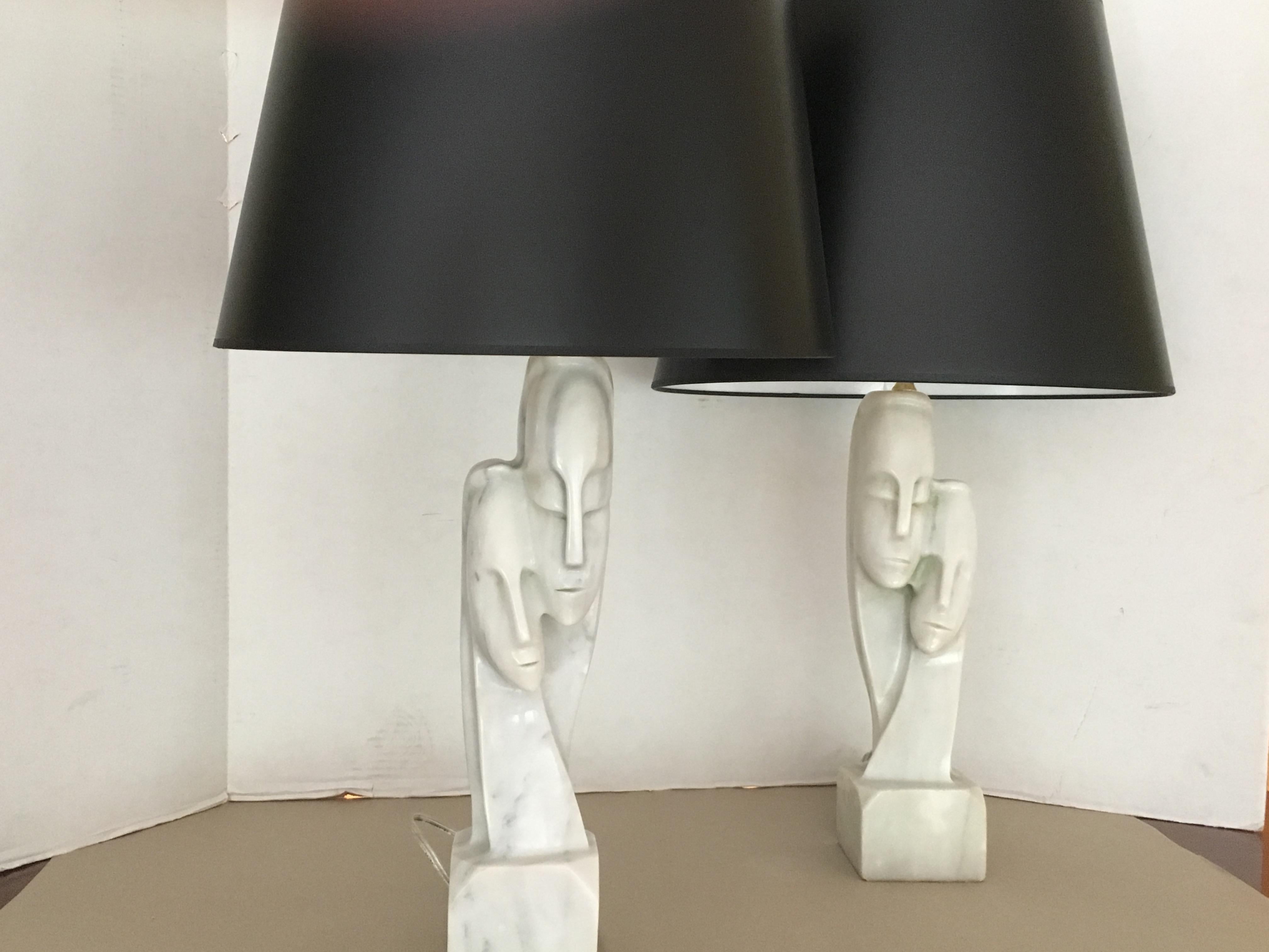 A pair of hand-carved marble Cycladic face lamps.