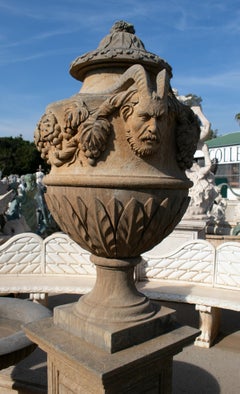 Pair of Hand Carved Marble Urns on Pedestals with Antique Patina