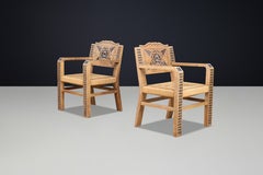 Pair of Hand-Carved Oak Armchairs, in the Manner of Joseph Savina, France 1930