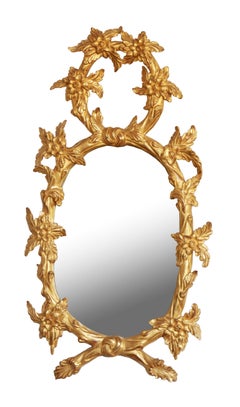 Pair of Hand Carved Oval Gilt Wood Mirrors by La Maison London