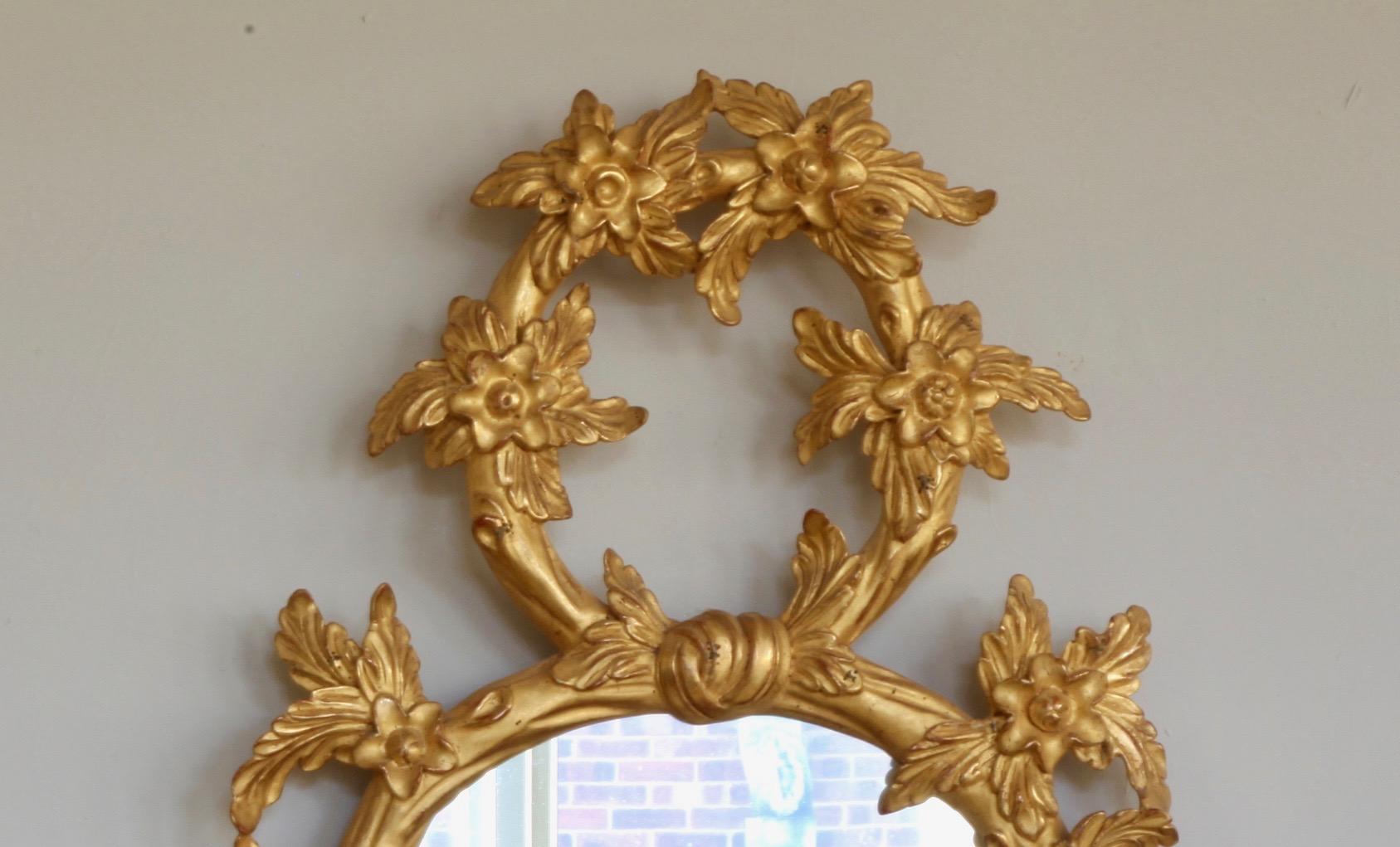 English Pair of Hand Carved Oval Gilt Wood Mirrors by La Maison London For Sale