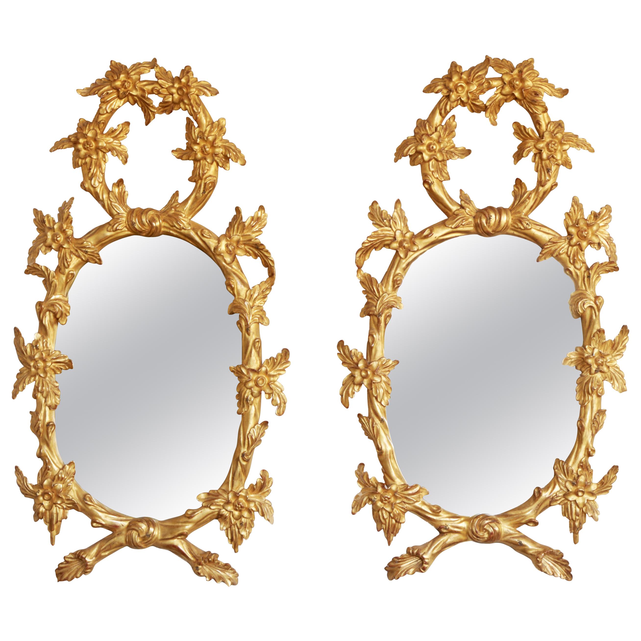 Pair of Hand Carved Oval Gilt Wood Mirrors by La Maison London For Sale