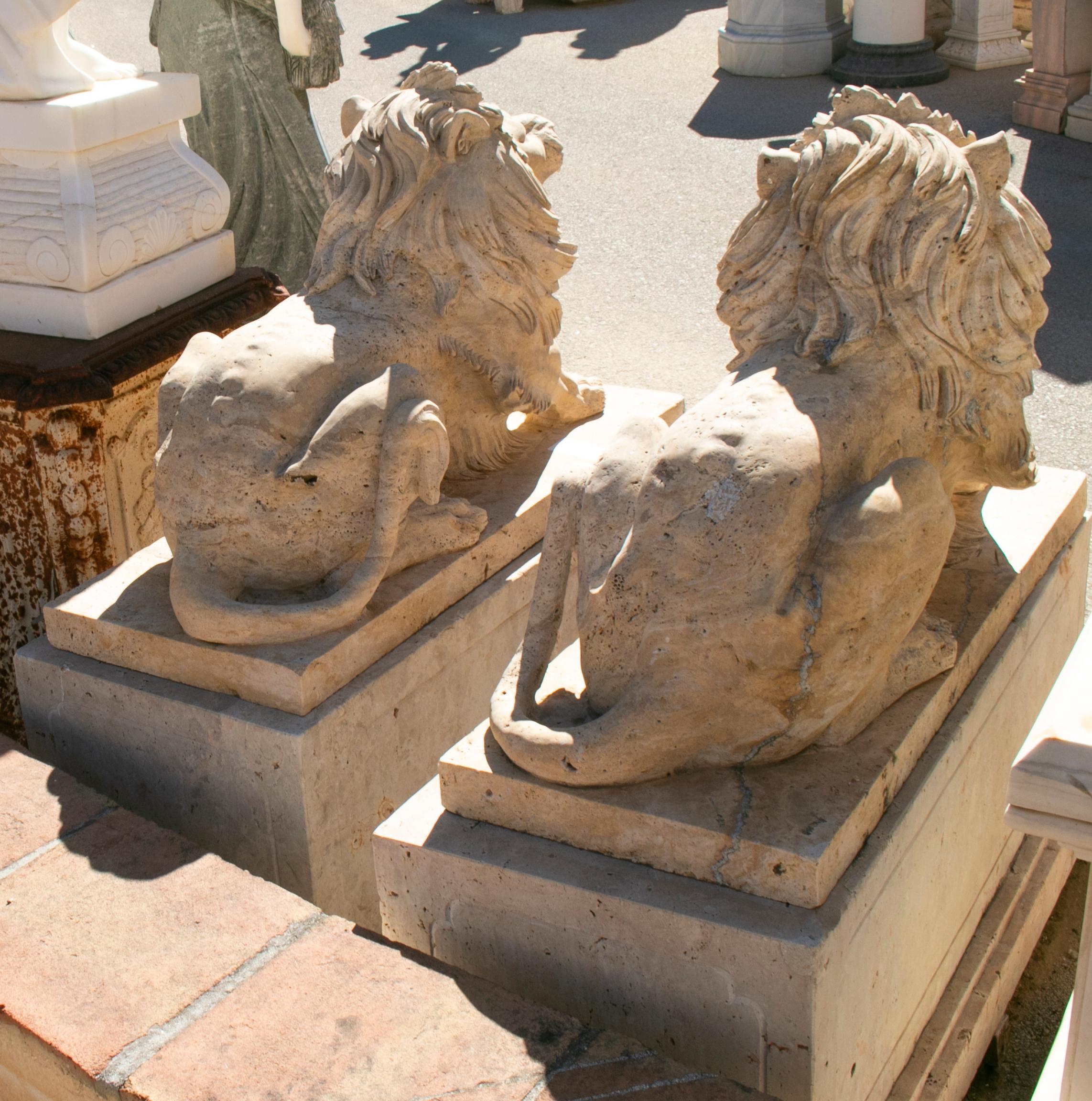 European Pair of Hand Carved Travertine Marble Lions with Bases