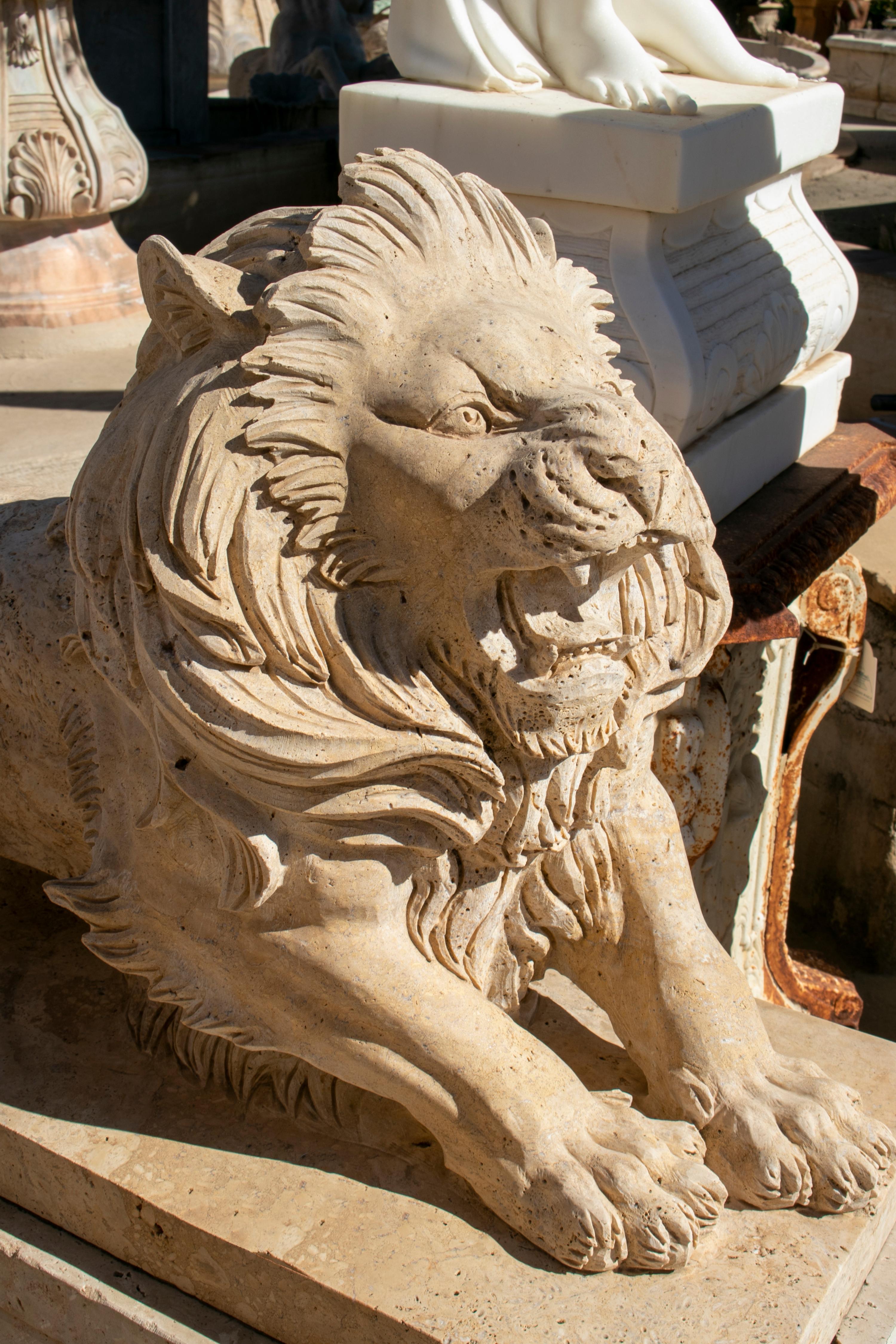 Pair of Hand Carved Travertine Marble Lions with Bases In Good Condition In Marbella, ES
