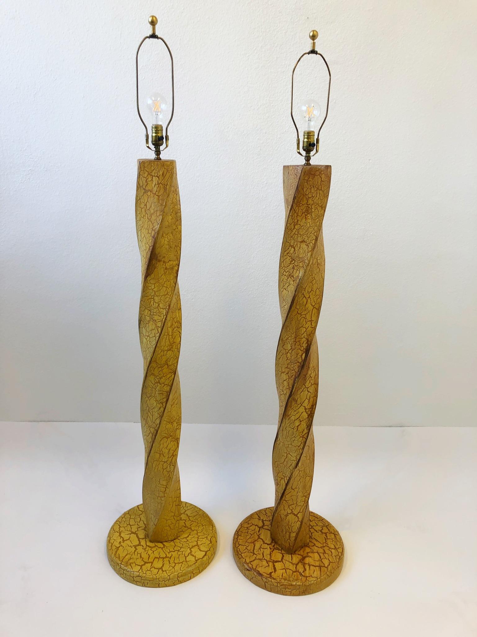 Pair of carved wood floor lamps with a custom crackle lacquered finish design by Dana Creath designs for Steve Chase in the 1980s.
Newly rewired, shades are original.
They show minor wear consistent with age.
Measurements: 16” diameter, 67.5”