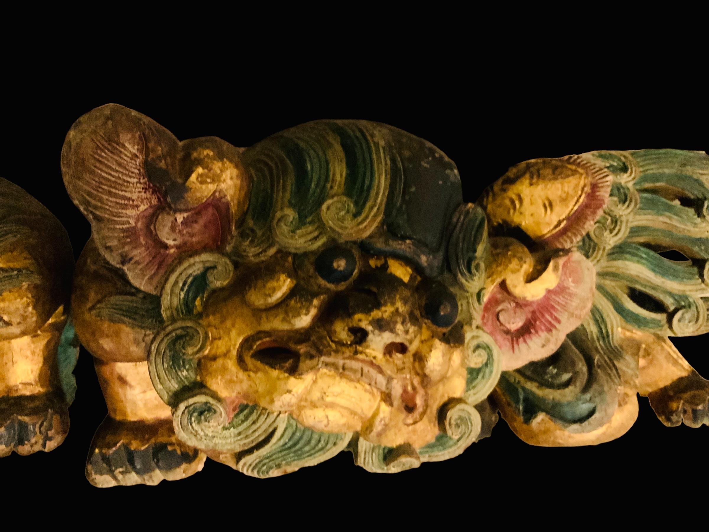 Chinese Pair Of Hand Carved Wood Polychromatic FooDogs