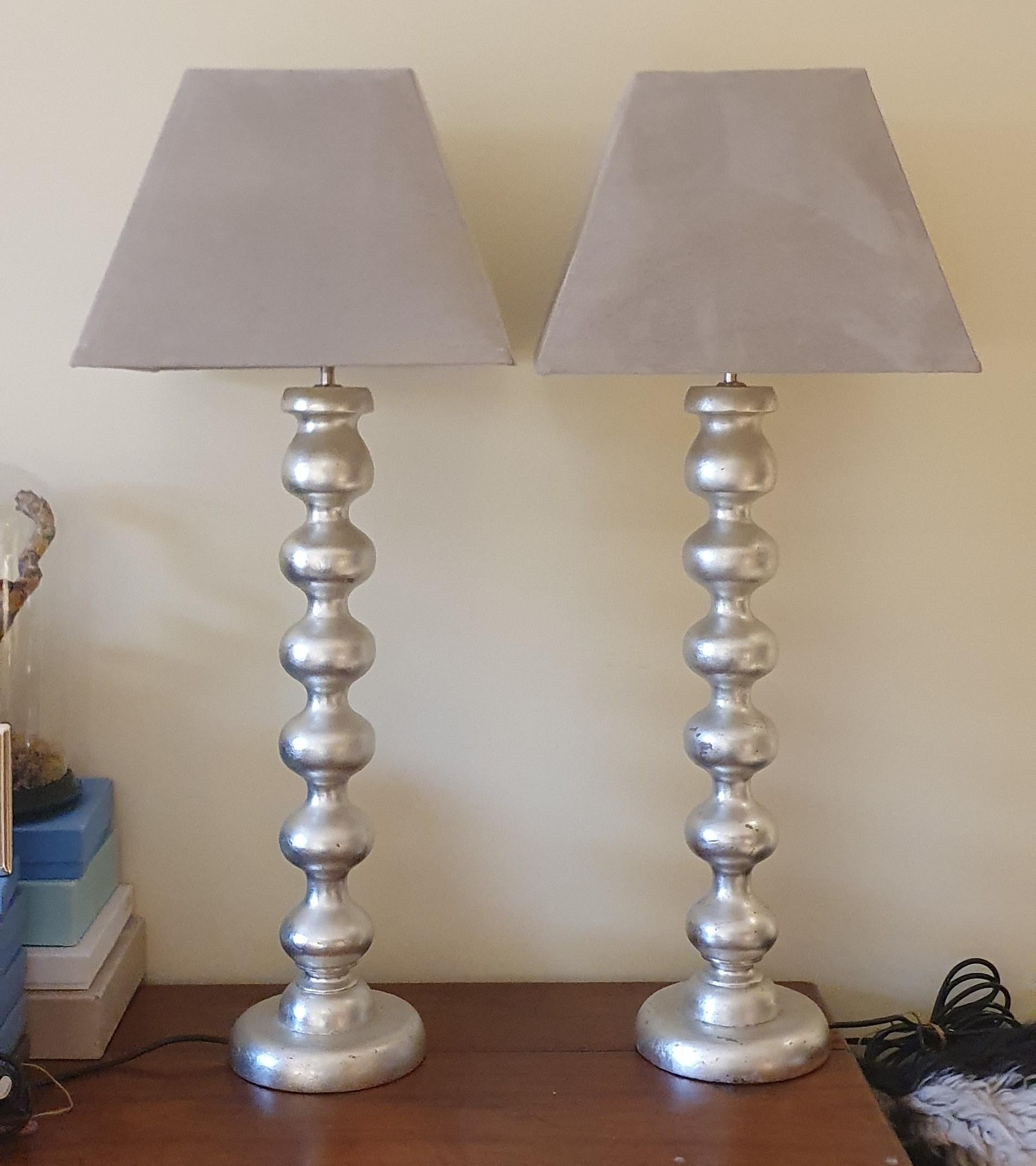 Hollywood Regency Pair of Hand carved wooden Bobble lamps Antiqued Silver Leaf with Suede shades For Sale