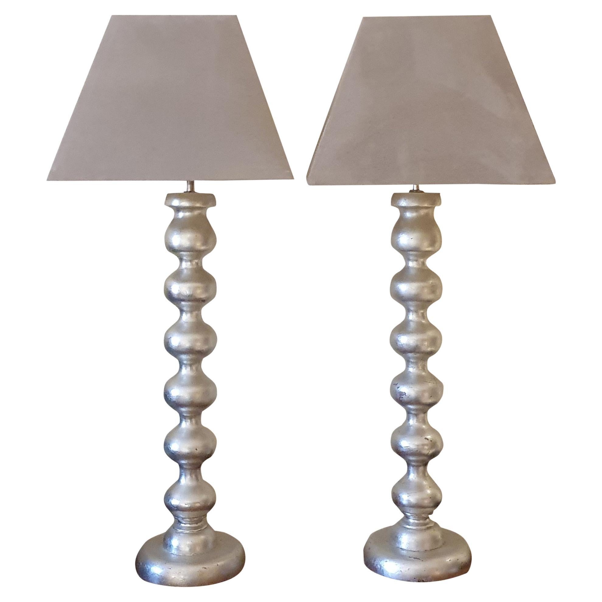 British Pair of Hand carved wooden Bobble lamps Antiqued Silver Leaf with Suede shades For Sale