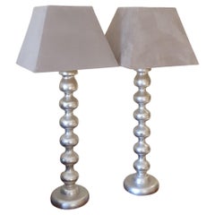 Pair of Hand carved wooden Bobble lamps Antiqued Silver Leaf with Suede shades