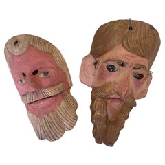 Pair of Hand Carved Wooden Folk Art Masks
