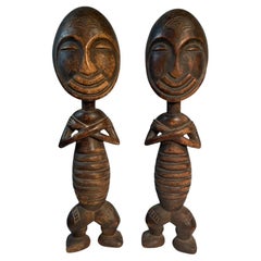 Pair of Hand Carved Wooden Tribal Figures