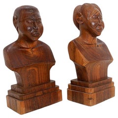 Pair of hand-carved wooden woman/man bust statues - 20th