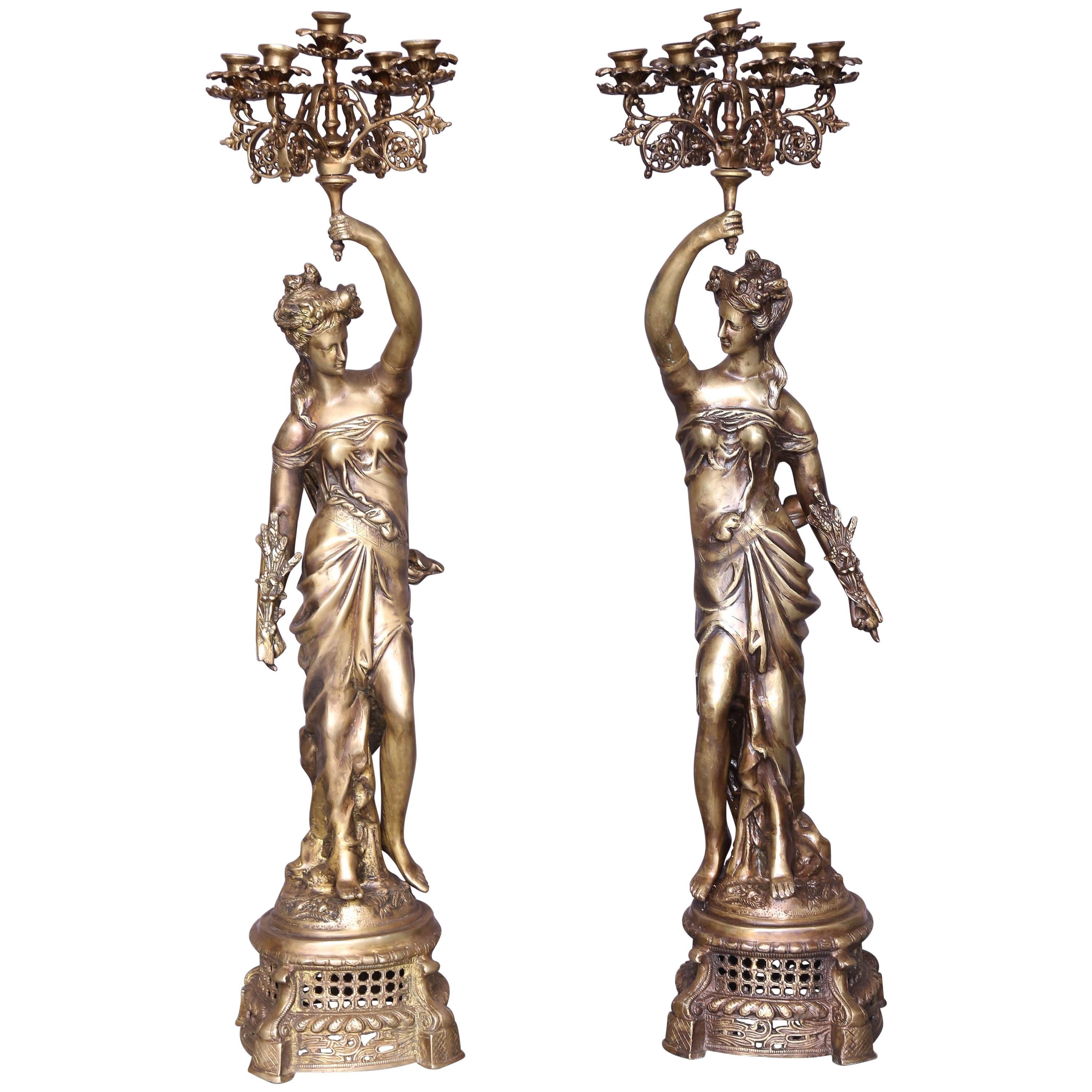 Pair of Hand Cast Bronze Continental Ladies Holding Five-Arm Candelabras For Sale