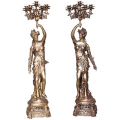 Pair of Hand Cast Bronze Continental Ladies Holding Five-Arm Candelabras