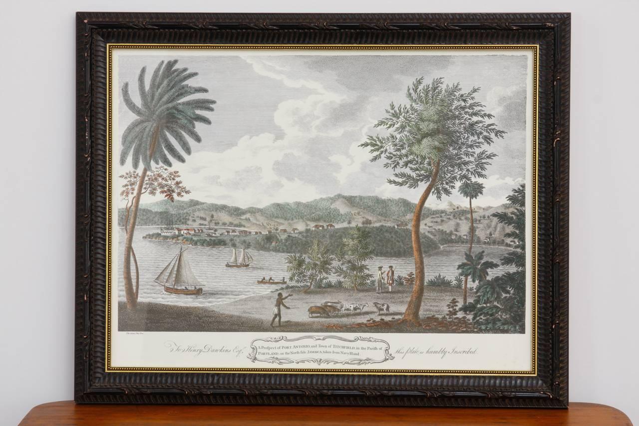 Impressive pair of hand-colored British colonial prints of landscapes and farm life in Jamaica. Taken from an 18th century engraving depicting Port Antonio and Rio Bono. Made in England and framed for Elizabeth Benefield Interiors. Intricate prints