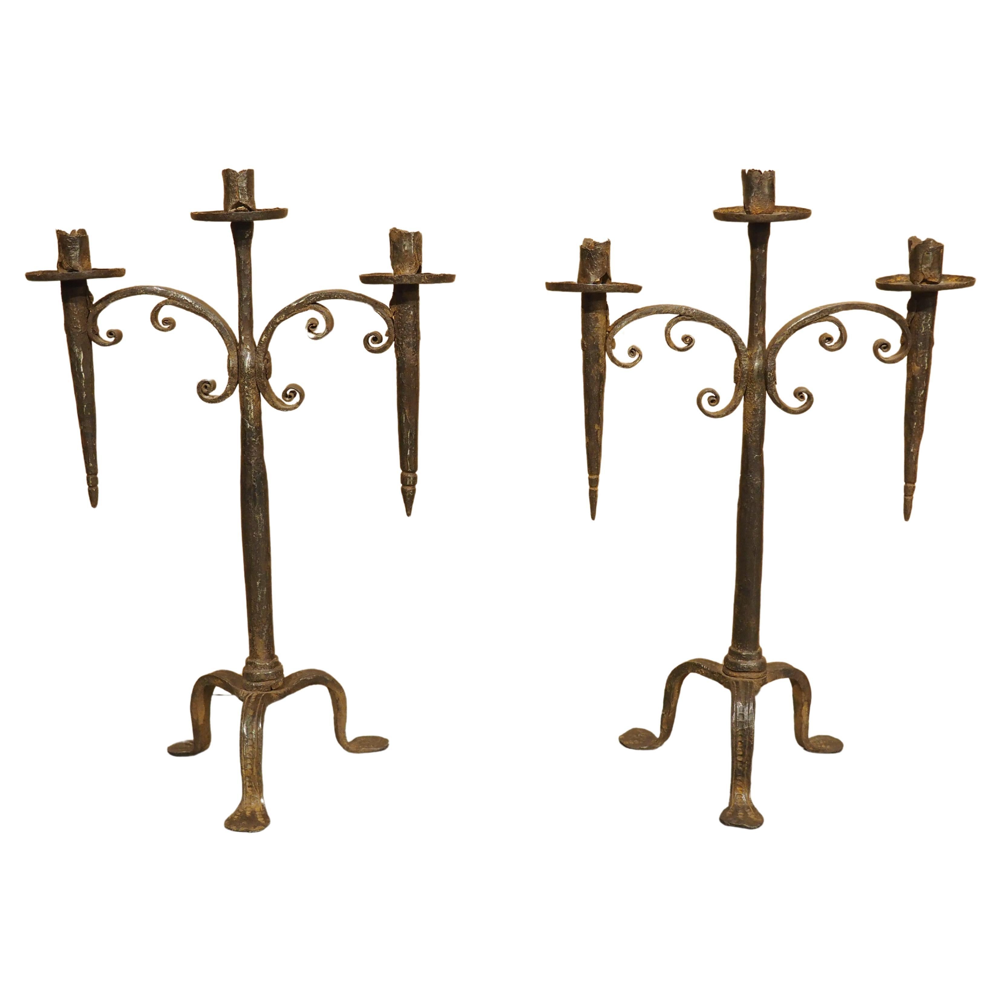 Pair of Hand Forged 18th Century Spanish Iron Torchere Candle Holders For Sale