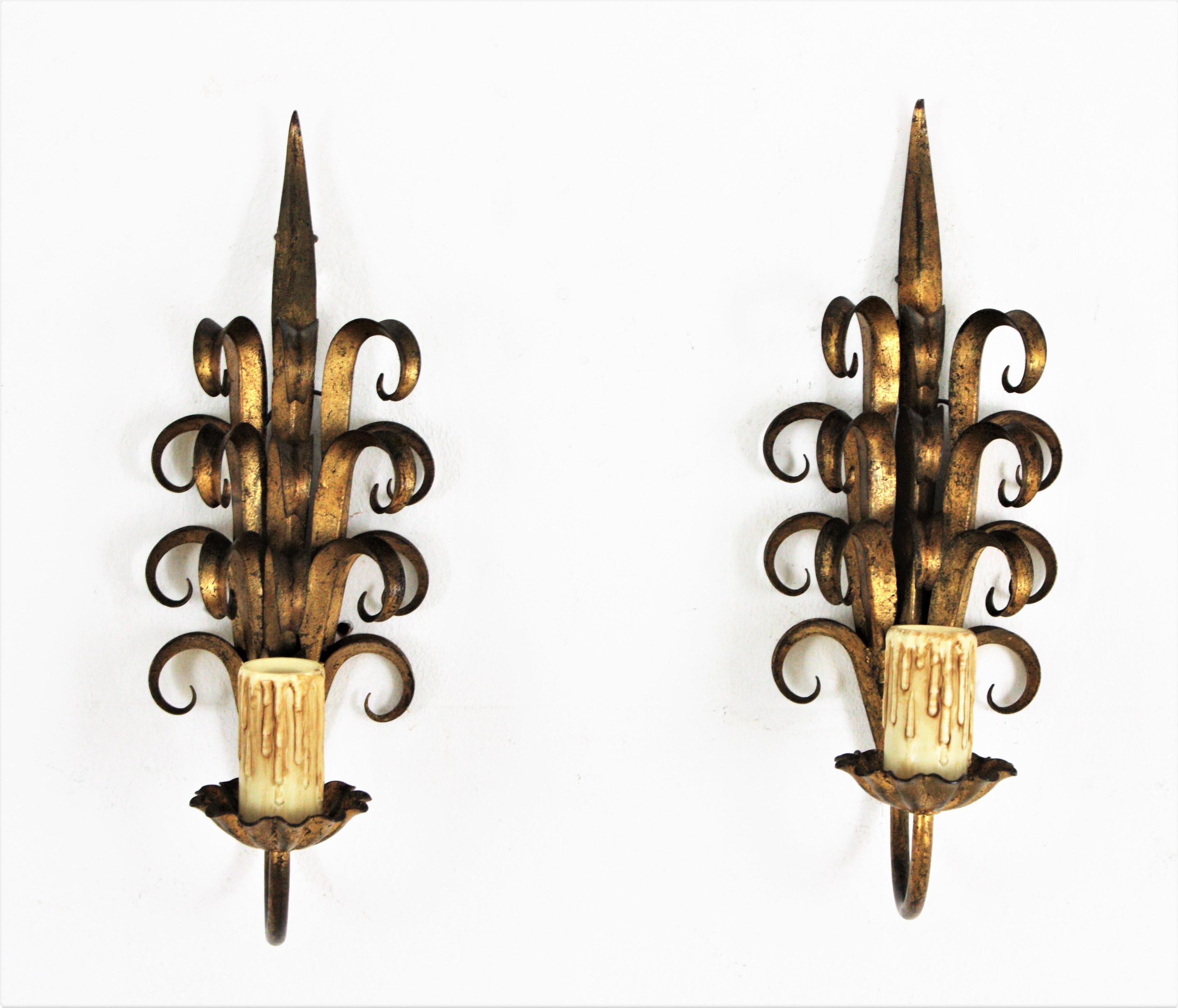 Hand-Crafted Pair of Hand Forged Gilt Iron Wall Sconces in Eyelash Scroll Design For Sale