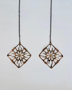 Pair of Hand-Forged Swedish Iron Sun Wall Hangings, 1970s
