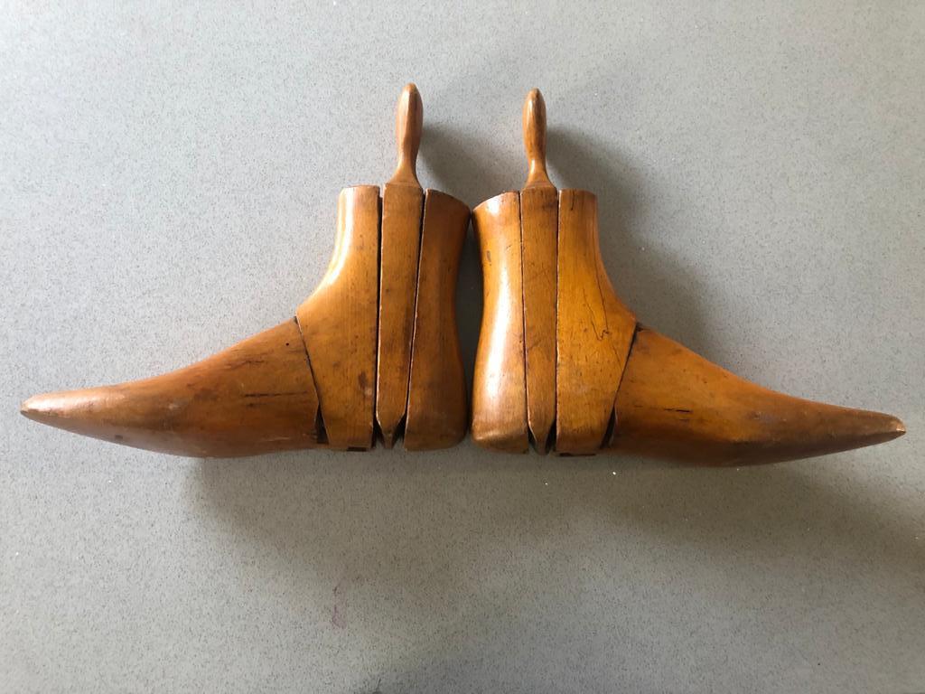 A fine pair of handmade vintage wooden shoe inserts, 20th century. Great for use and decoration. Size 8.

  