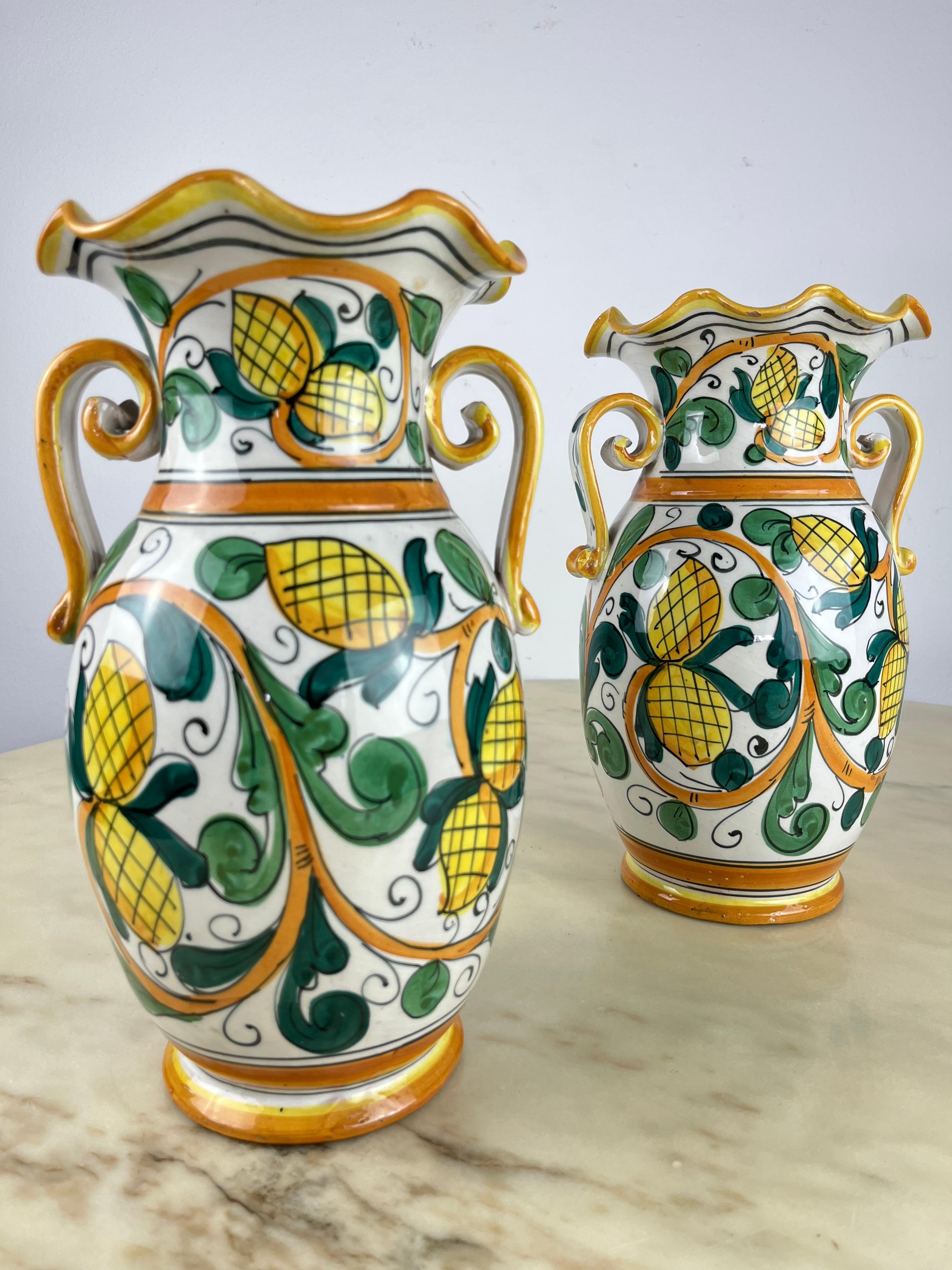 Pair of hand-painted and hand-crafted ceramic amphorae Caltagirone, Italy, 1980s
Purchased by my grandparents, they are 31 cm high. Hand painted Sicilian lemons. Intact and in excellent condition.