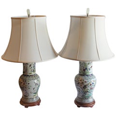 Pair of Hand-Painted Porcelain Lamps with Jade Finials and Wood Plinths