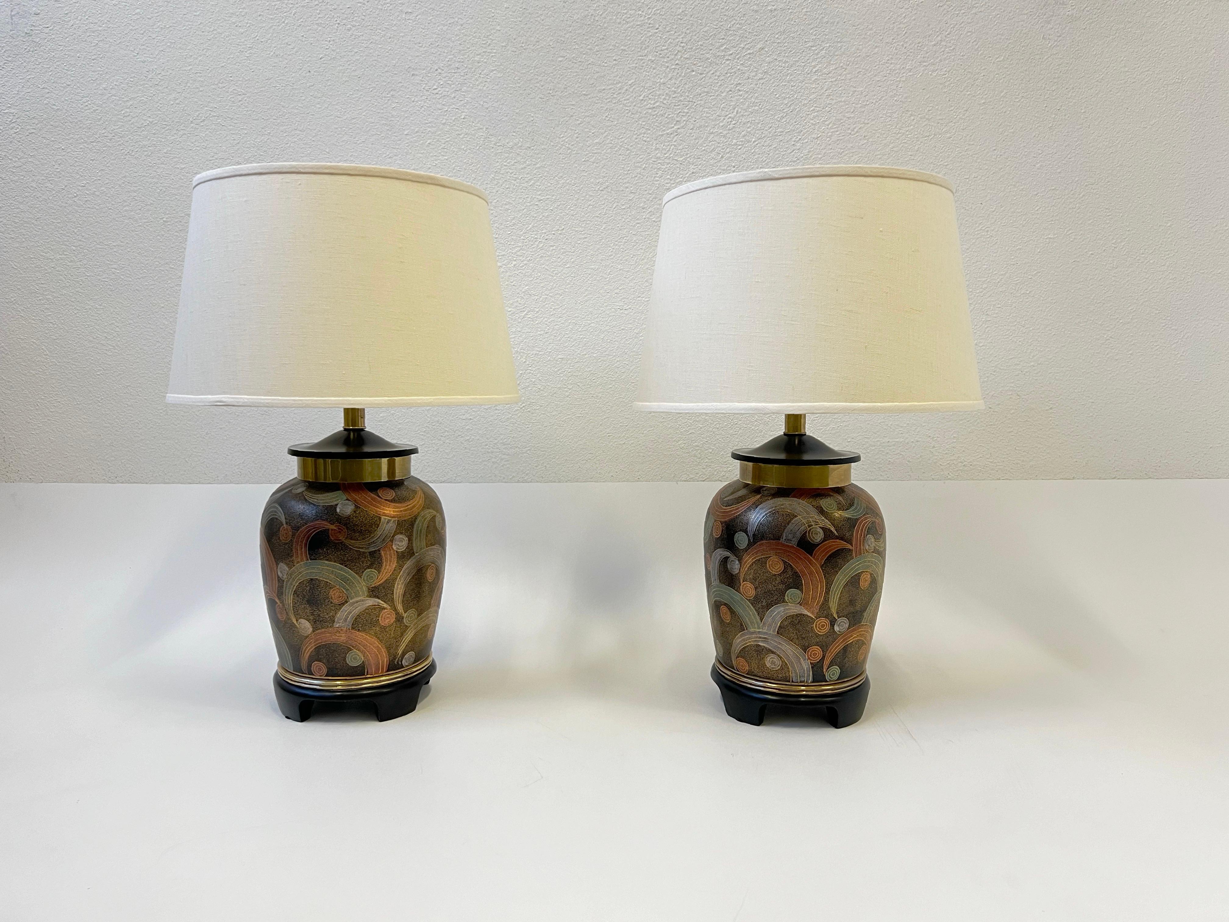 1980’s hand painted porcelain urn table lamps by Frederick Cooper Chicago. 
Constructed with hand painted porcelain urns, brass hardware, black lacquer base with new vanilla linen shades. 
They take 150w max Edison bulb. 

Measurements: 9” Diameter,