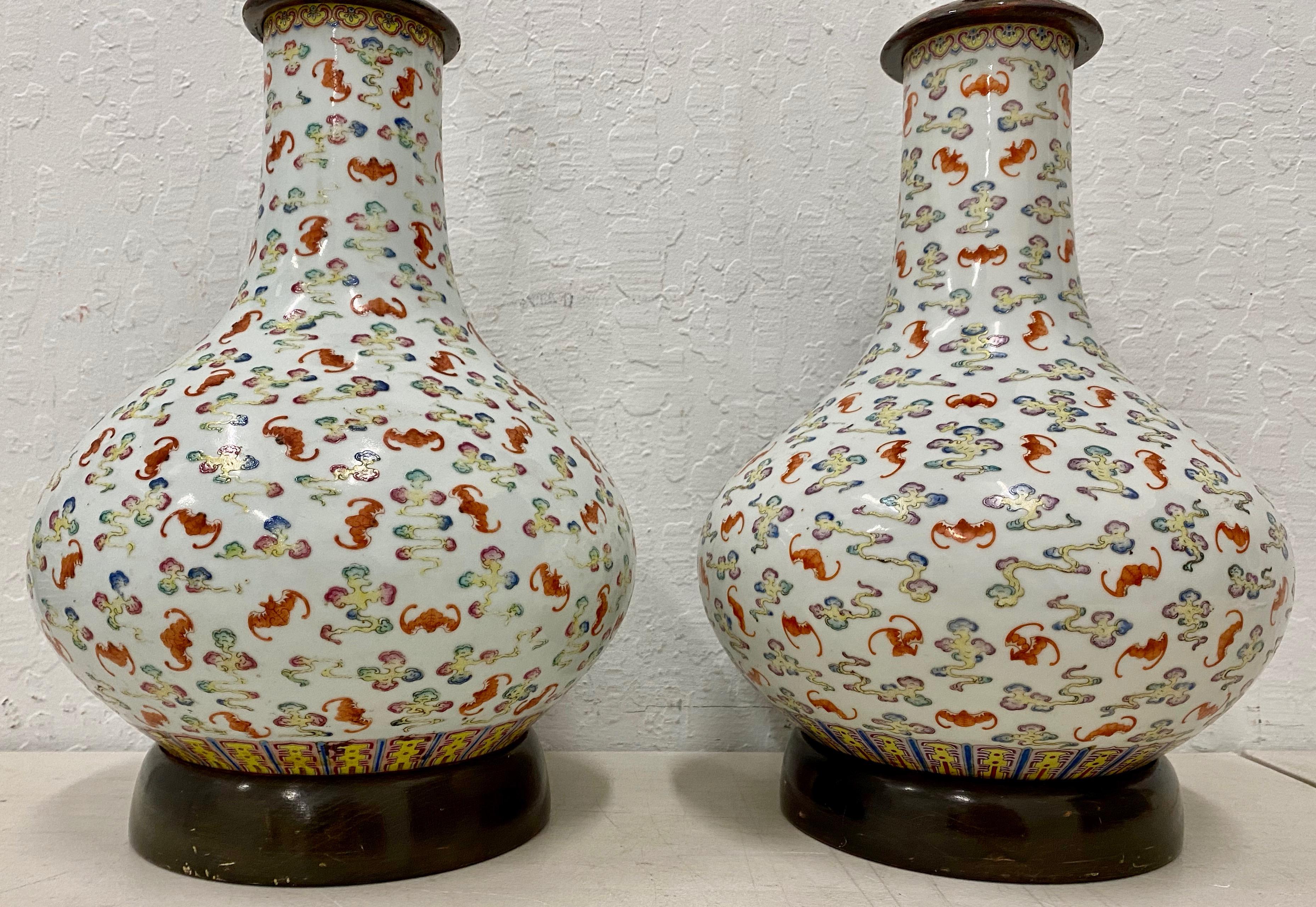Pair of hand painted Qing dynasty porcelain vase table lamps, circa 1910s-1940s

Gorgeous hand painted vases converted to table lamps.

100 bats design. Good luck. Good fortune.

The lamps are in very good condition. They are wired and ready