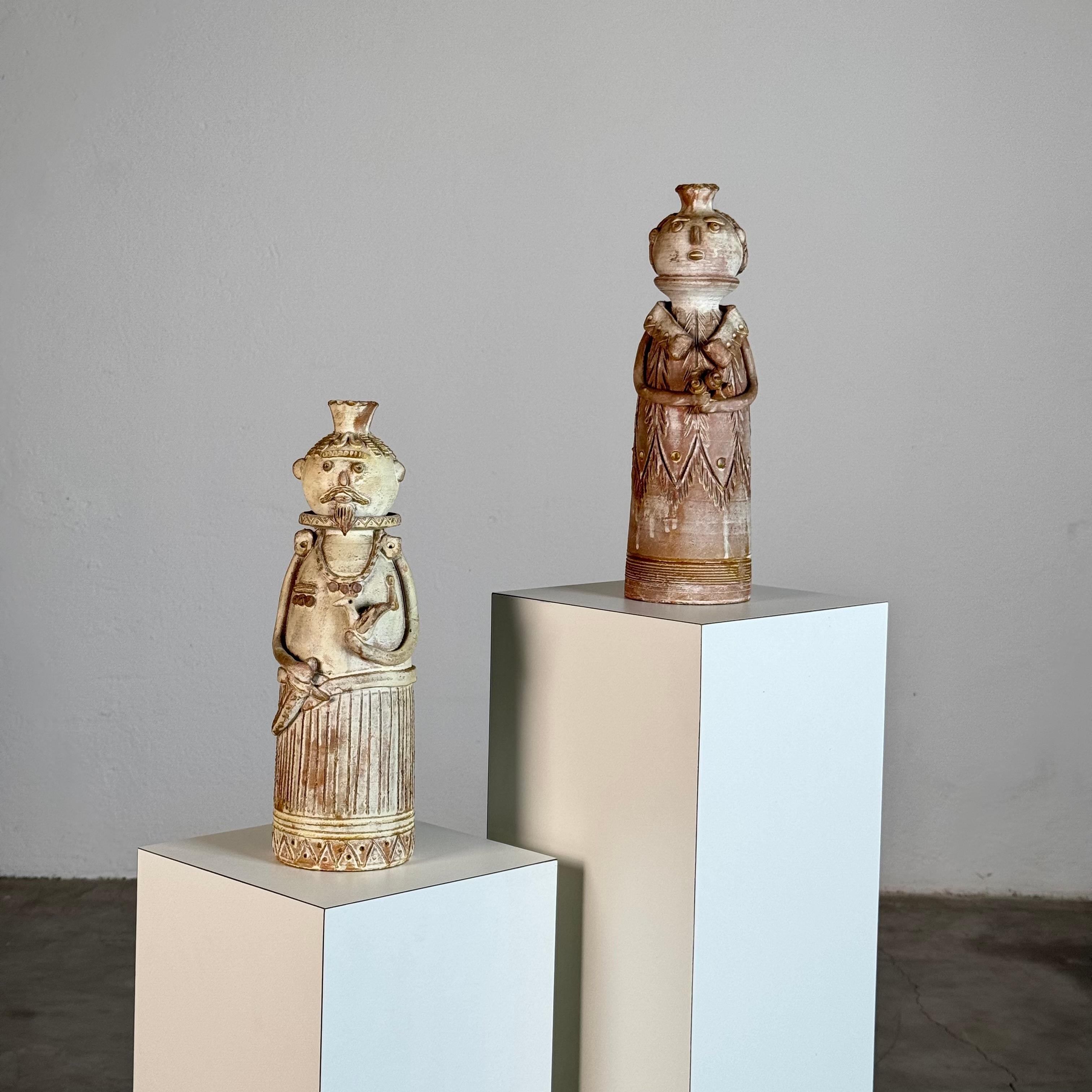 A stunning pair of hand-modeled terracotta sculptures by the Sardinian master ceramist Saverio Farci, representing a man and a woman. Each piece is entirely handmade, displaying Farci’s distinctive vocabulary of rustic symbolism, anthropomorphic