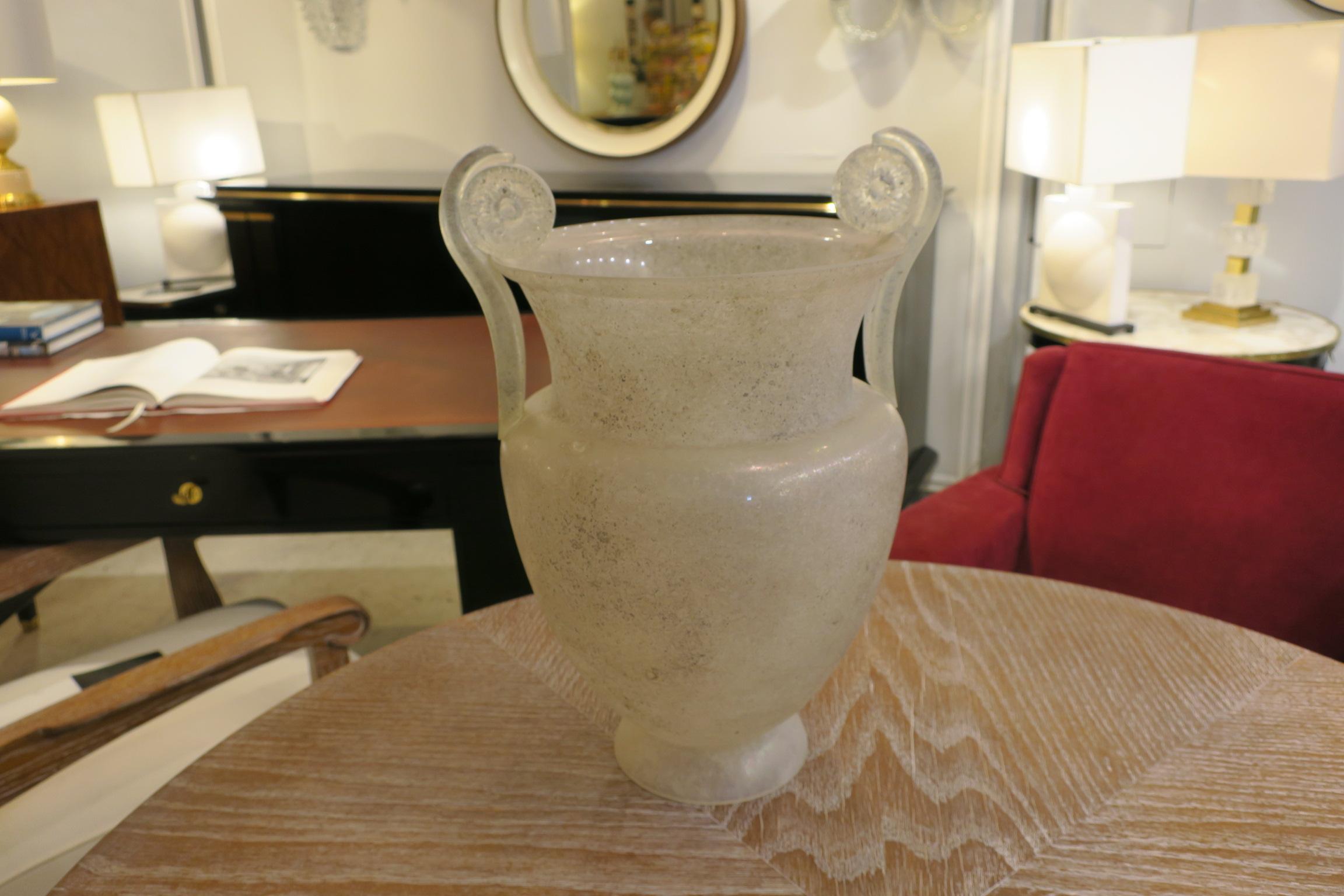 Pair of handblown glass urns.