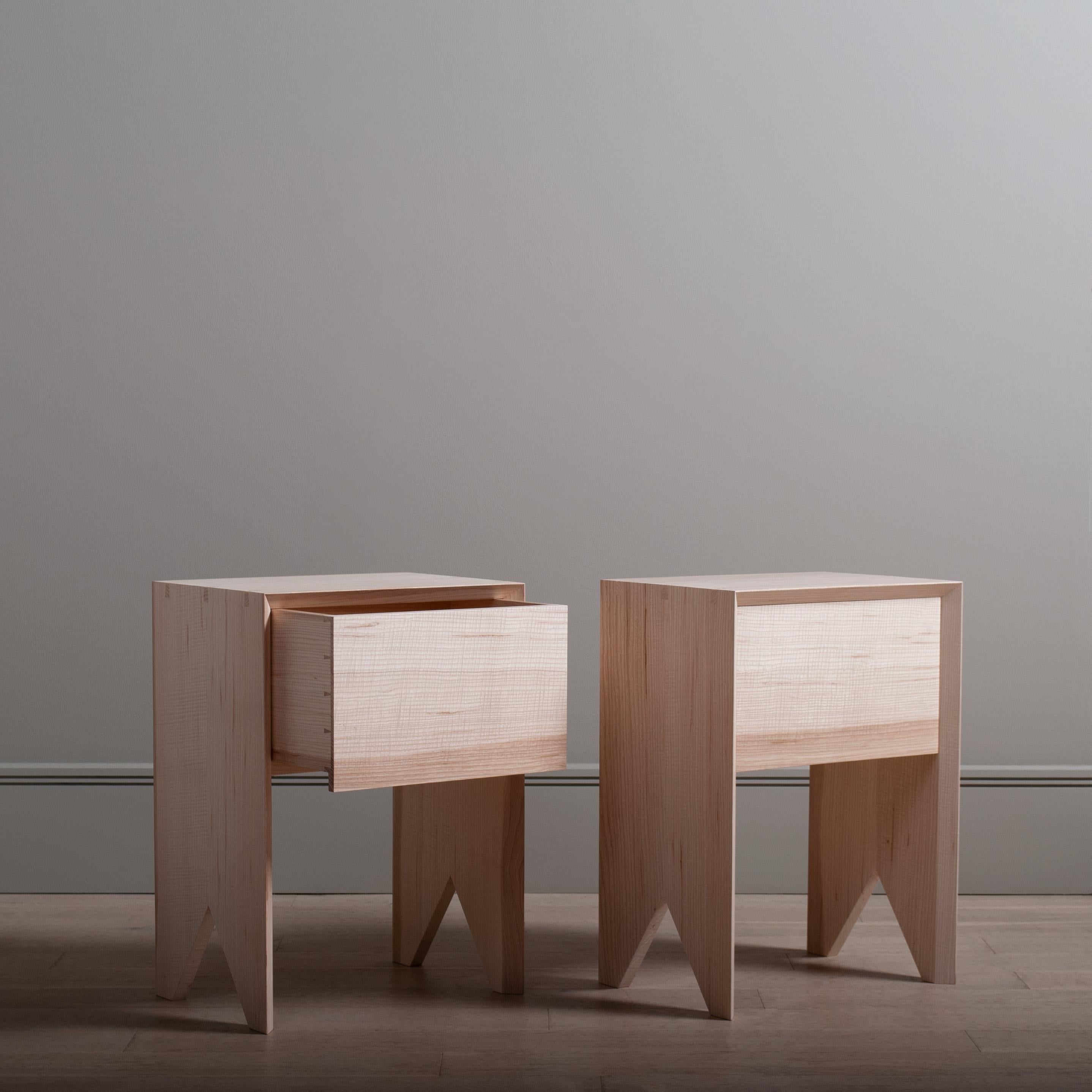 A pair of ultra sleek contemporary hand-crafted English 'ripple' ash night stand tables with storage drawer. 
Designed with real minimalism in mind - whilst highlighting the handmade construction details with exposed mitred key dovetail jointing.