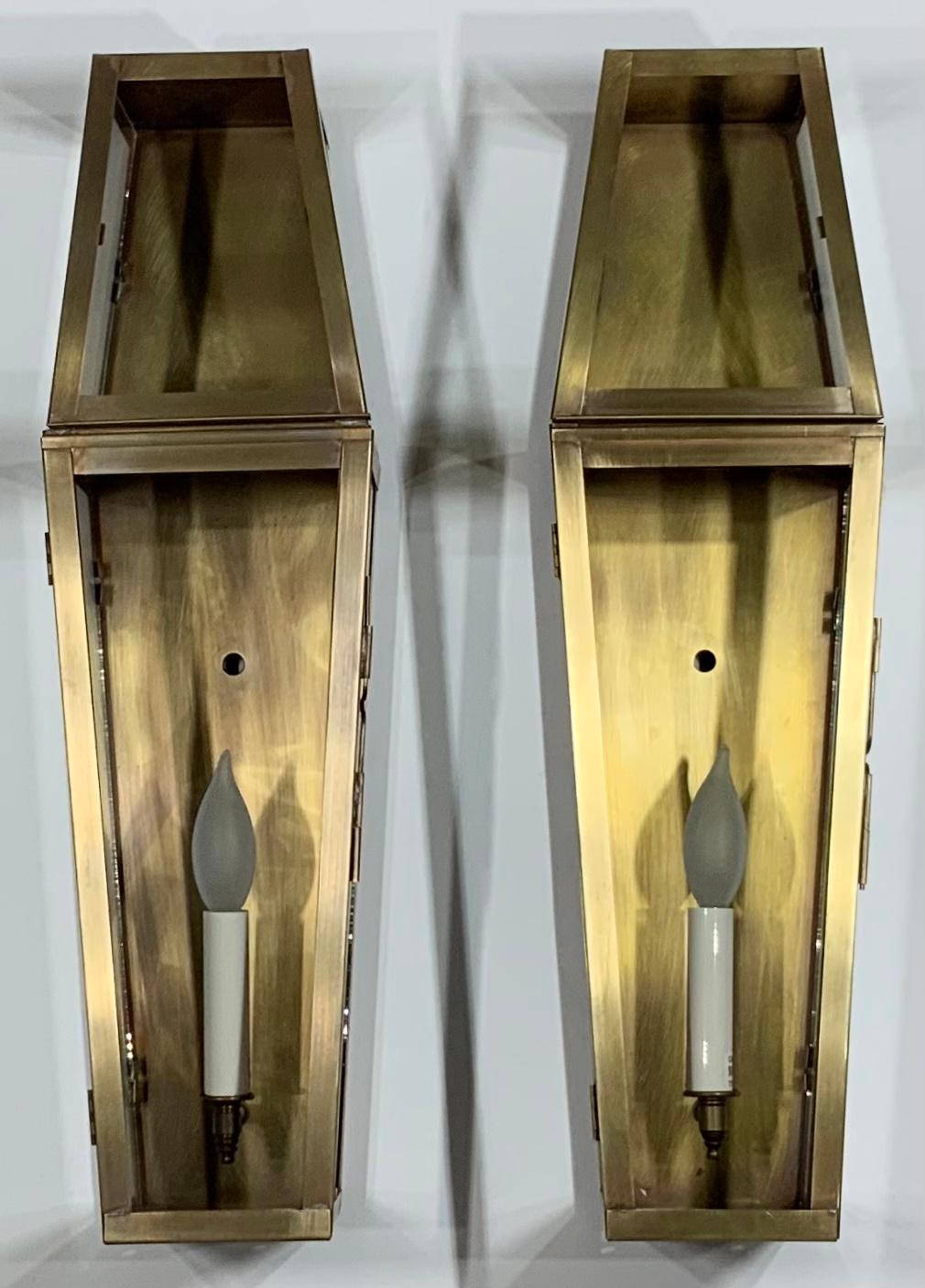 Elegant pair of wall lantern made of solid brass, exceptional quality workmanship, electrified with one 60/watt light each, clear glass.
Suitable for wet location, UL approved, up to US code.
Decorative pair of lantern for indoor or outdoor.