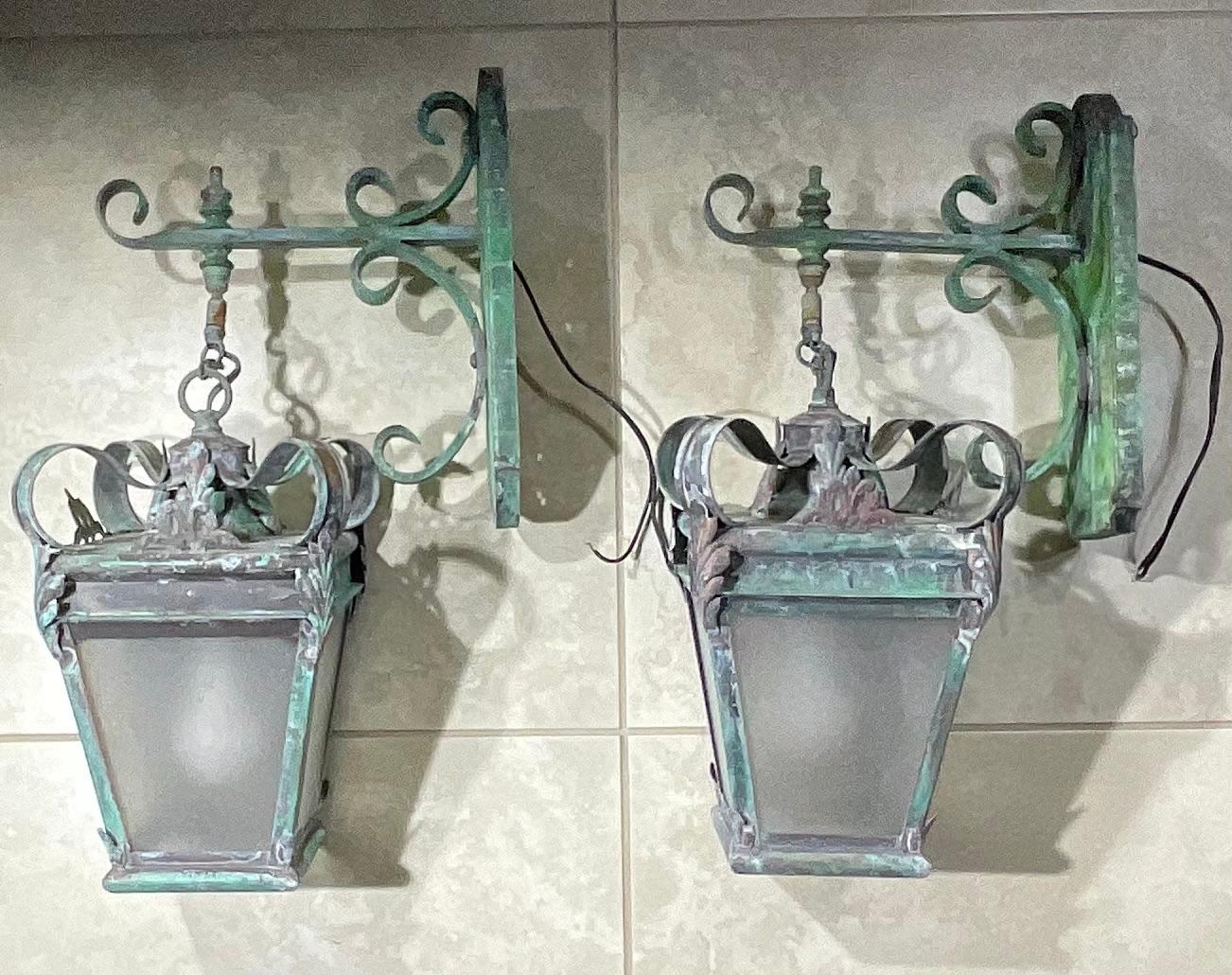 Beautiful pair of wall lantern made of solid brass and bronze , exceptional quality workmanship, electrified with one 60/watt light each,
Suitable for wet location.
Great patina decorative pair
Backplates are slightly deferent shape on the top see