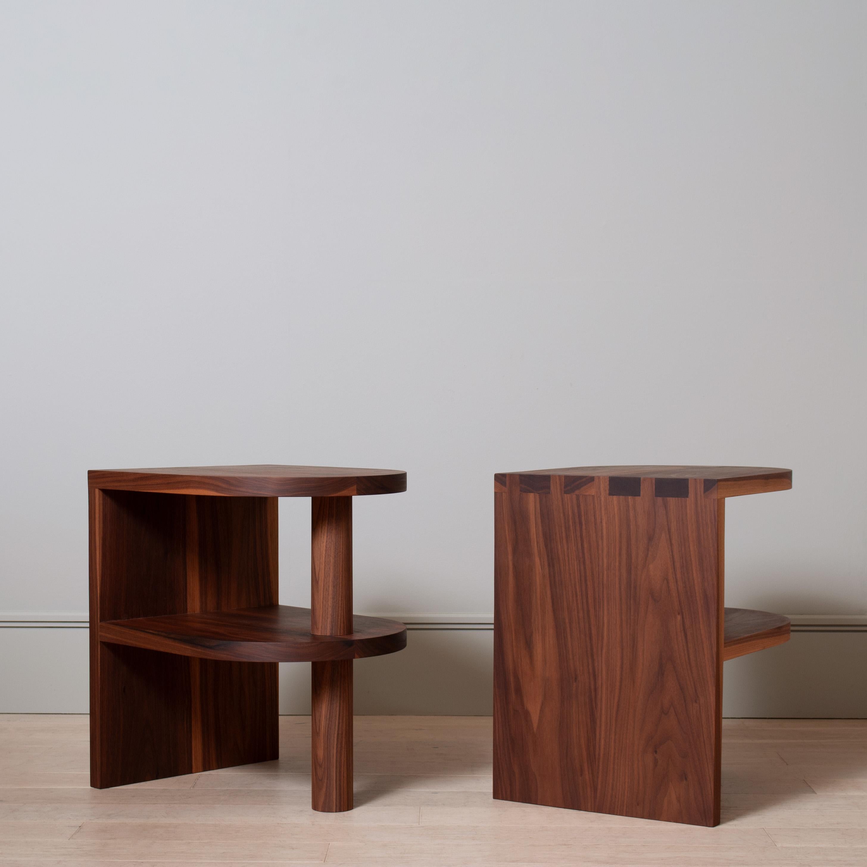 Handcrafted architectural American black walnut nightstands. Designed at Sum furniture and handcrafted using traditional furniture making techniques with the finest American Black Walnut. Hand-cut oversized dovetail jointing detail with a thick