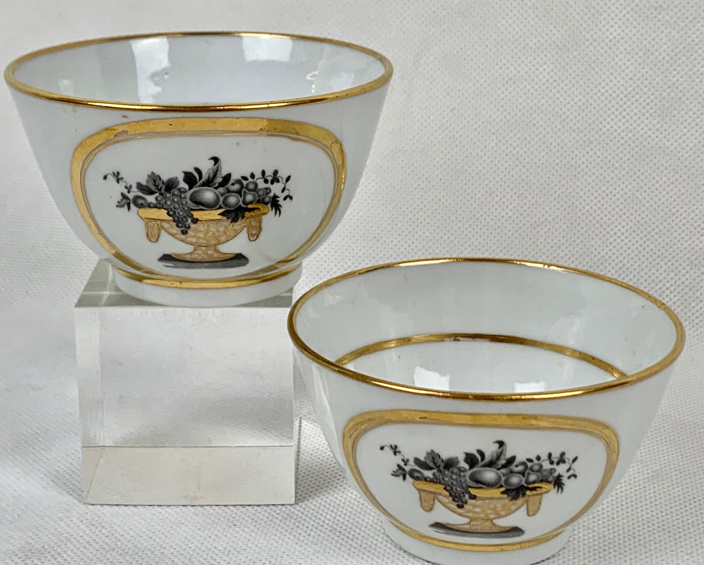 Pair of handleless tea bowls by the New Hall Porcelain Company Staffordshire, England, circa 1800. The scene depicts a footed porcelain bowl loaded with fresh fruit. The sides are decorated with gilt three leafed sprigs.
This pattern is in the
