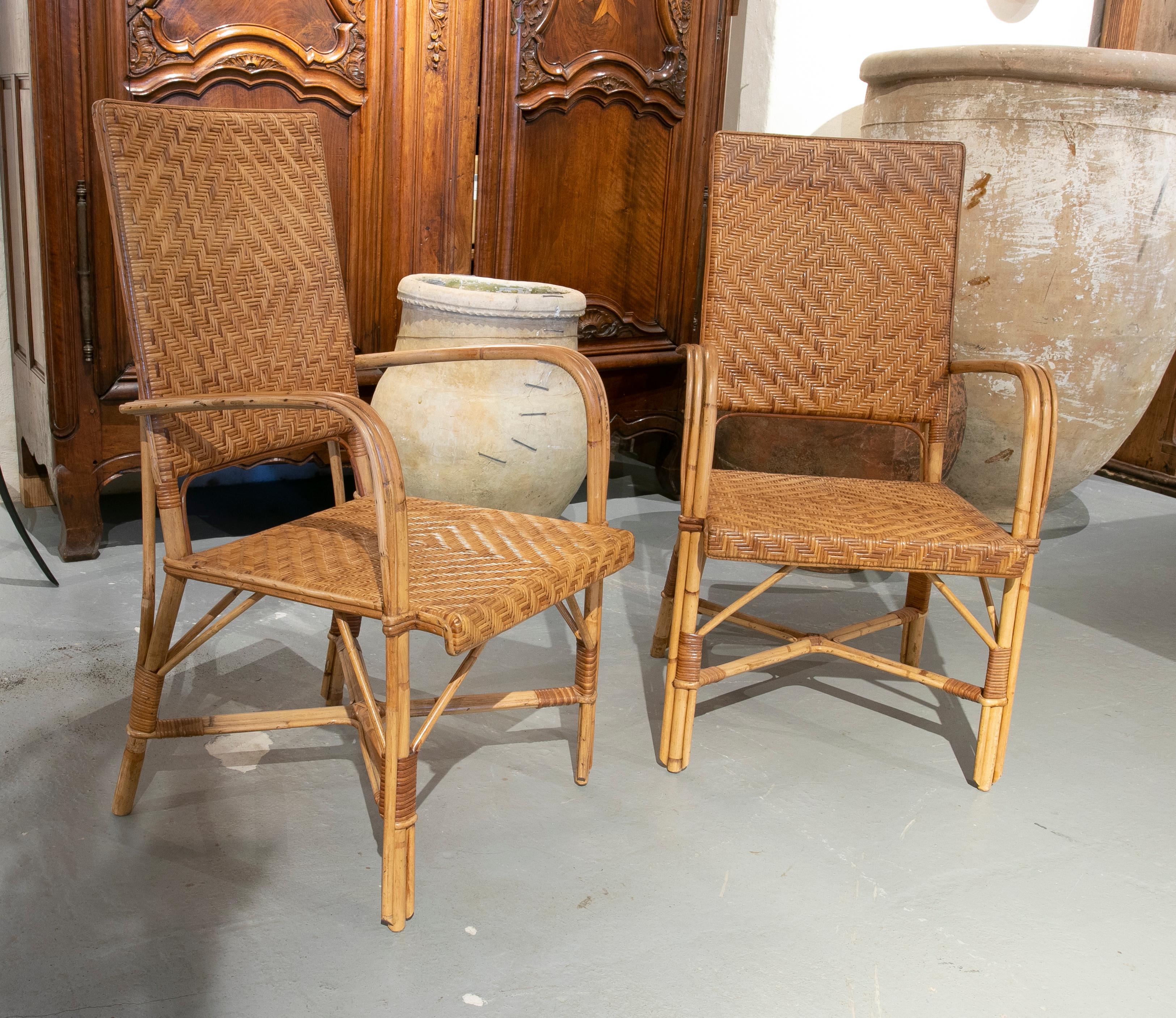 Pair of handmade spanish wicker armchairs from the 1970ies.