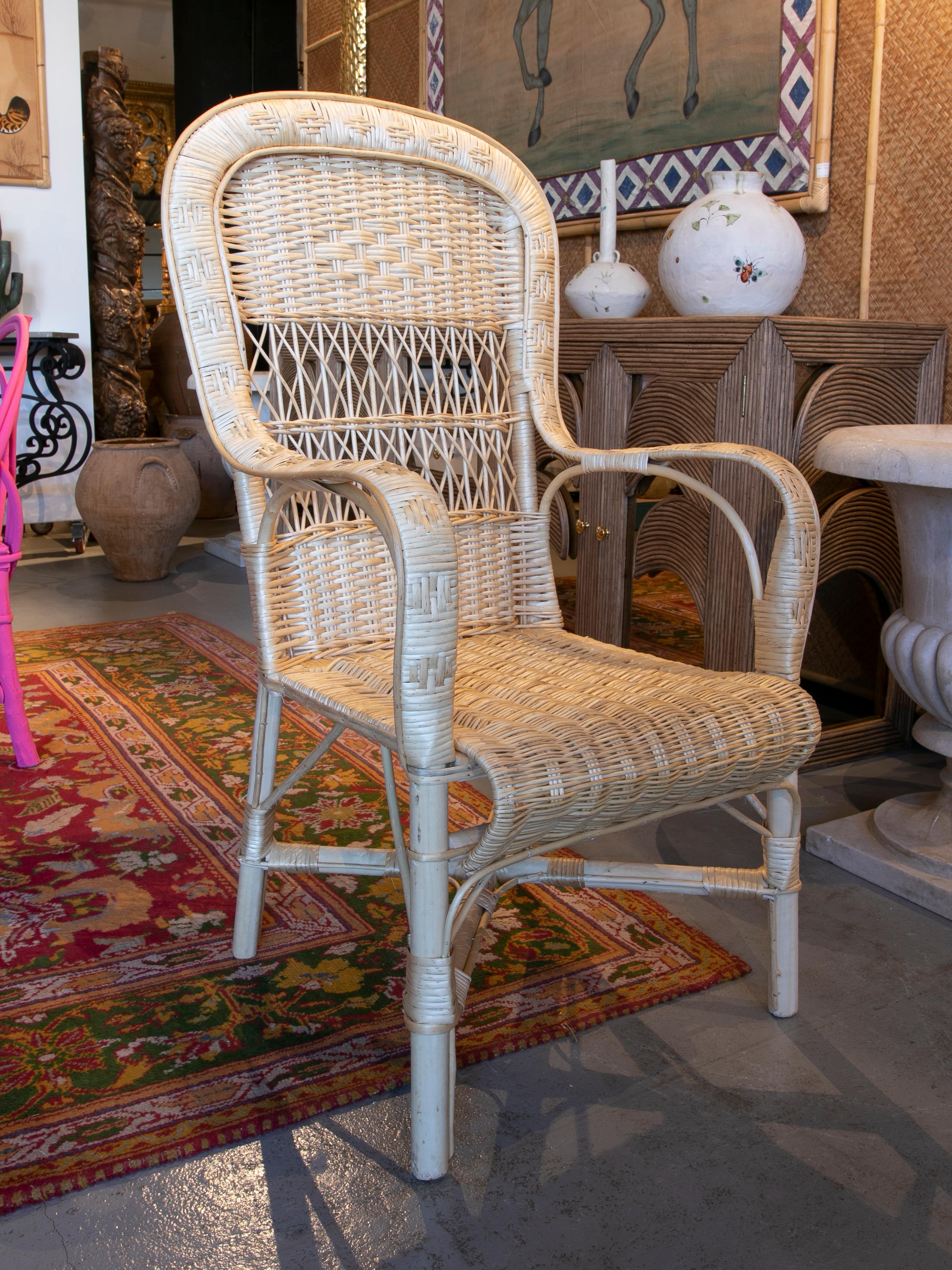 Pair of handmade wicker armchairs.