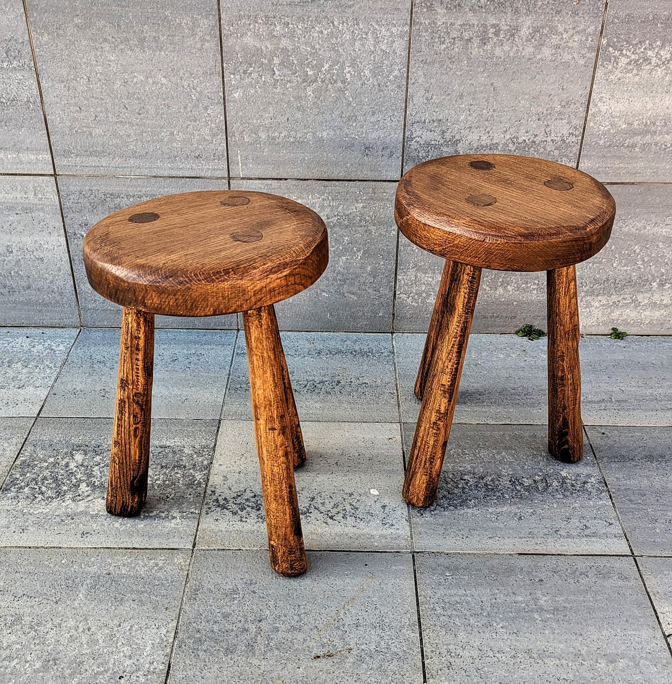 Rare and beautiful pair of handmade wooden stool, manufactured in France in 1970s. Incredible handmade of quality, with solid wood. Very rare and cool to have a pair.