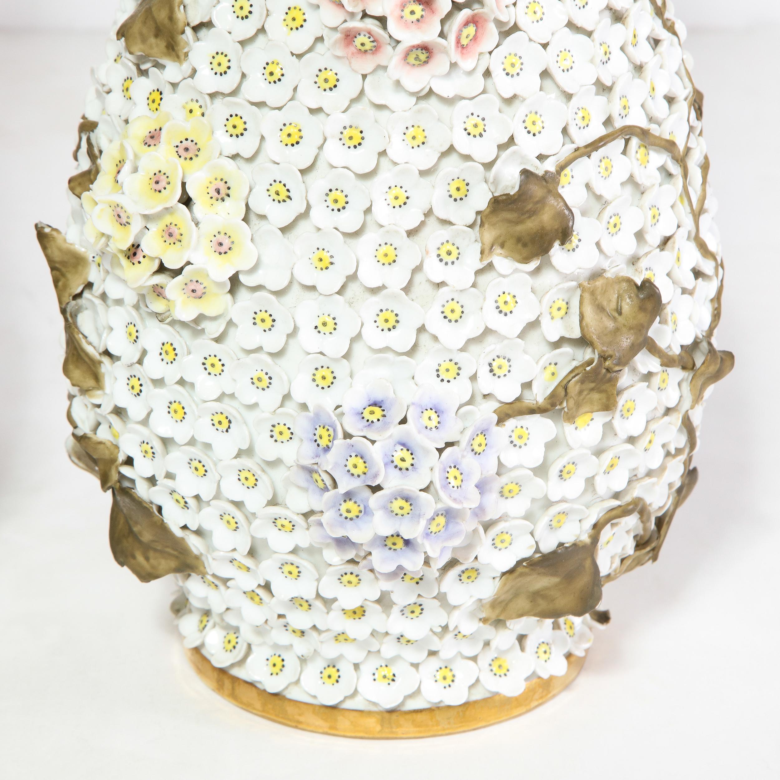 Porcelain Pair of Handpainted Lidded Snowballen Vases with Gilt accents & Floral Appliques