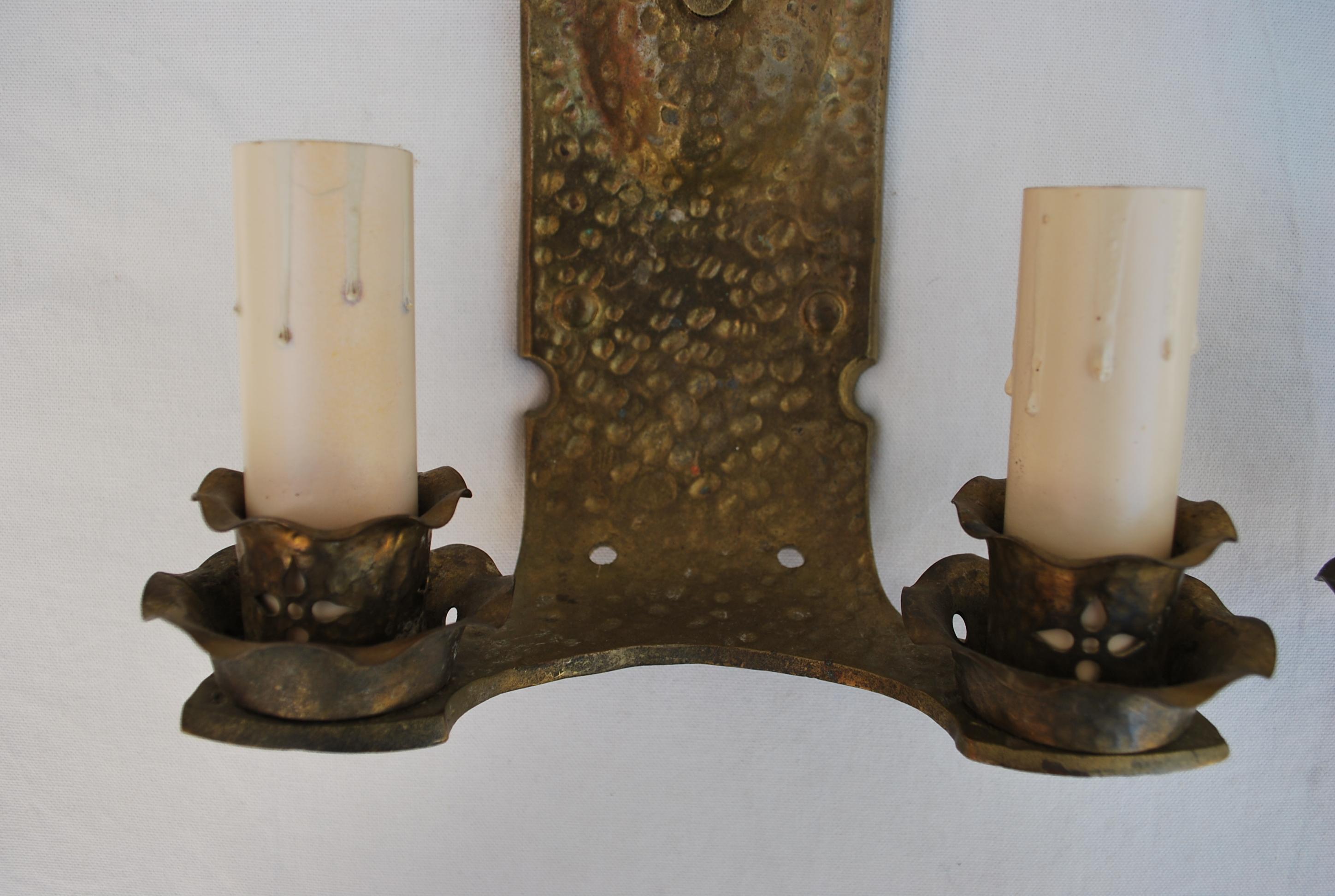 Early 20th Century Pair of hands  hammered  turn of the century solid brass sconces For Sale