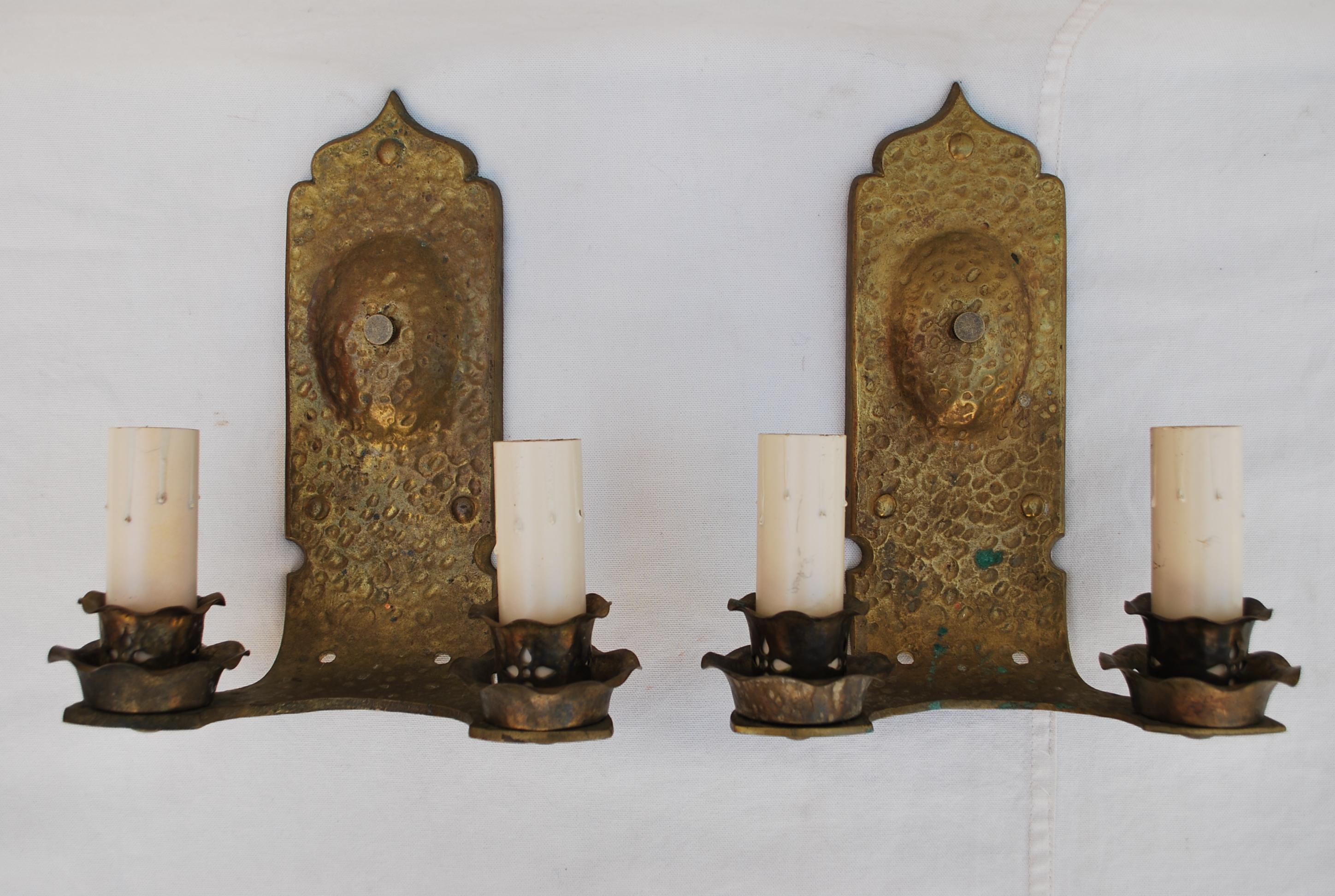 Brass Pair of hands  hammered  turn of the century solid brass sconces For Sale