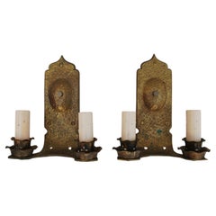 Pair of hands  hammered  turn of the century solid brass sconces
