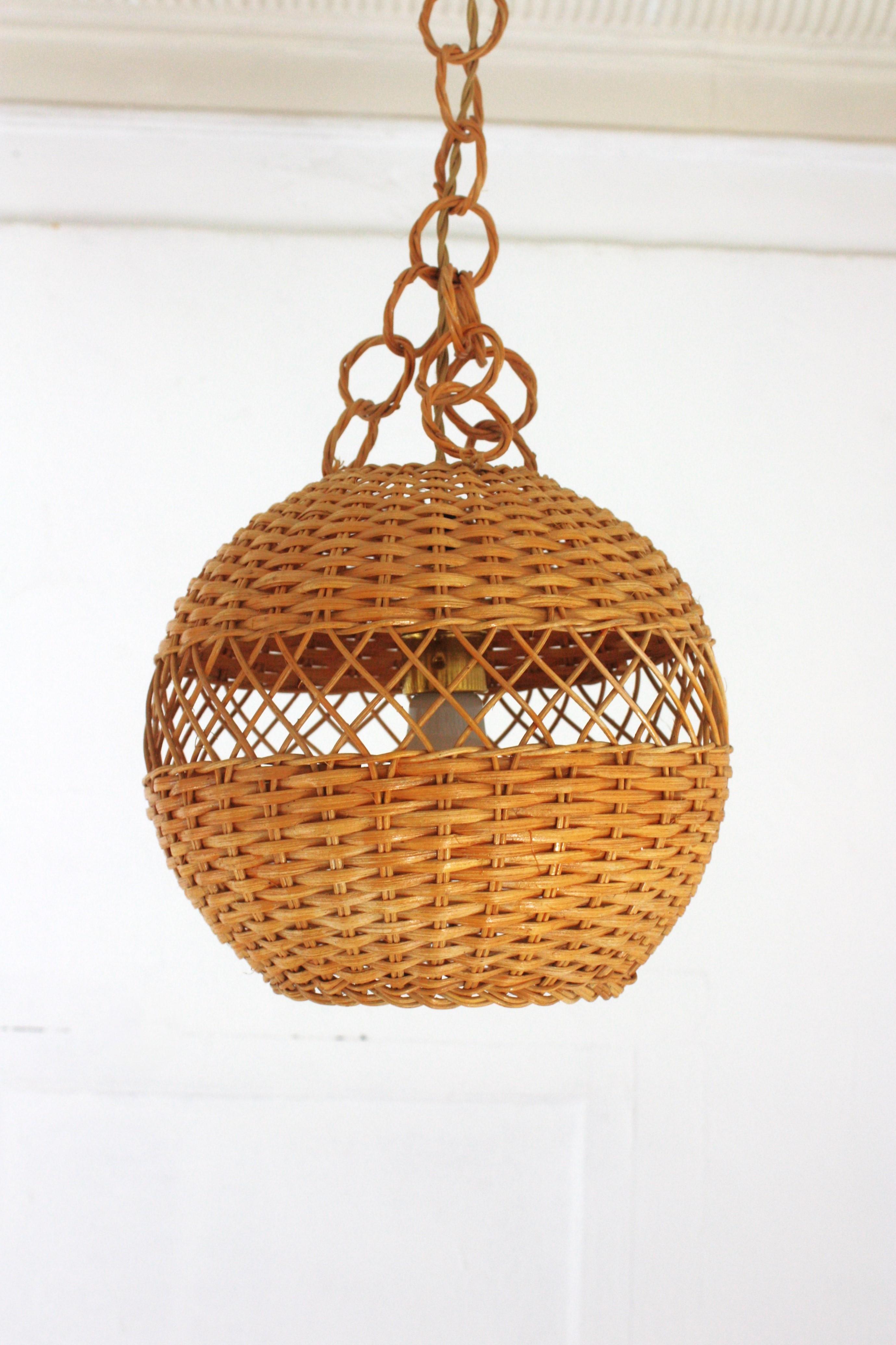Pair of Handwoven Wicker Globe Pendant Lights or Lanterns For Sale 3