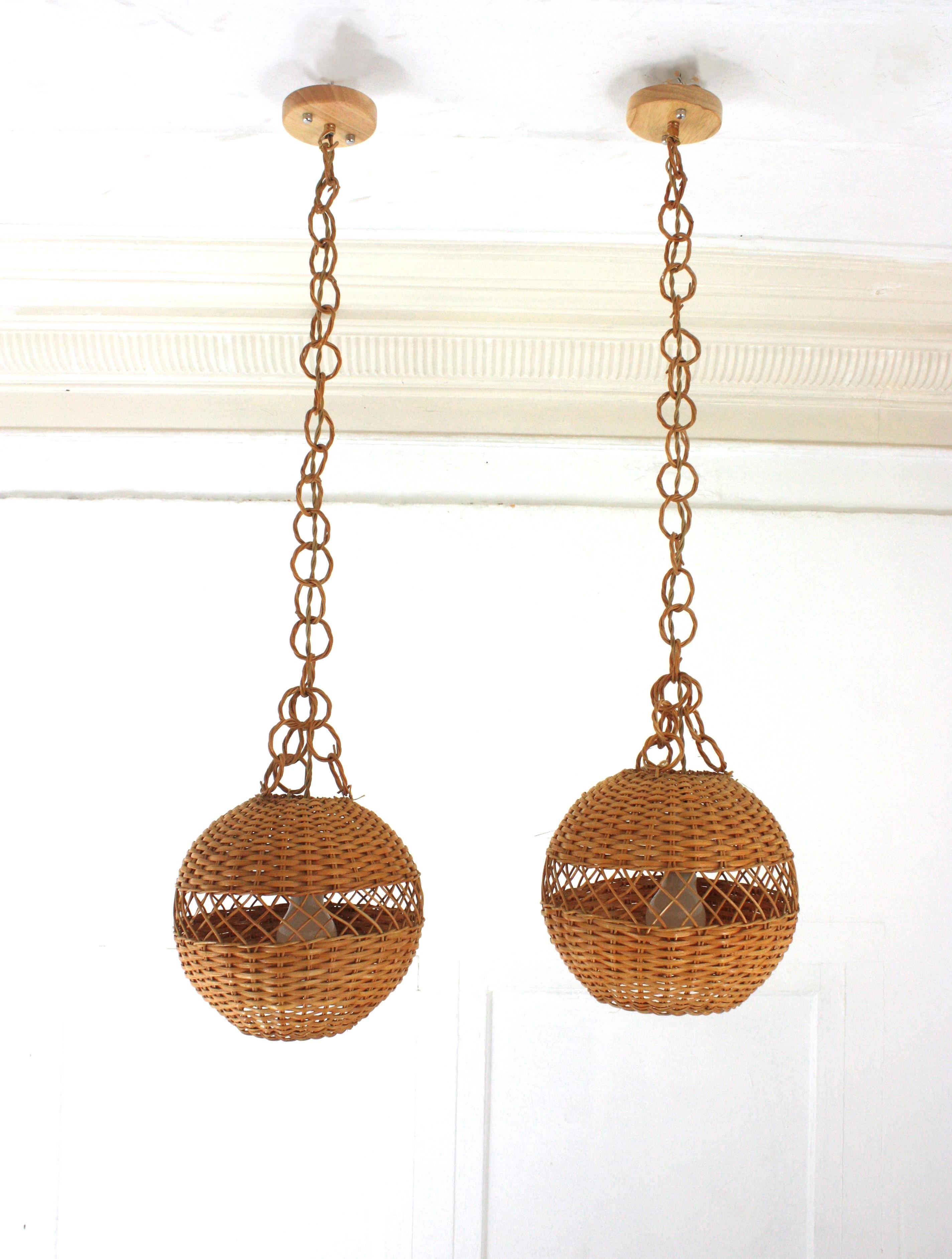 Pair of Handwoven Wicker Globe Pendant Lights or Lanterns For Sale 4