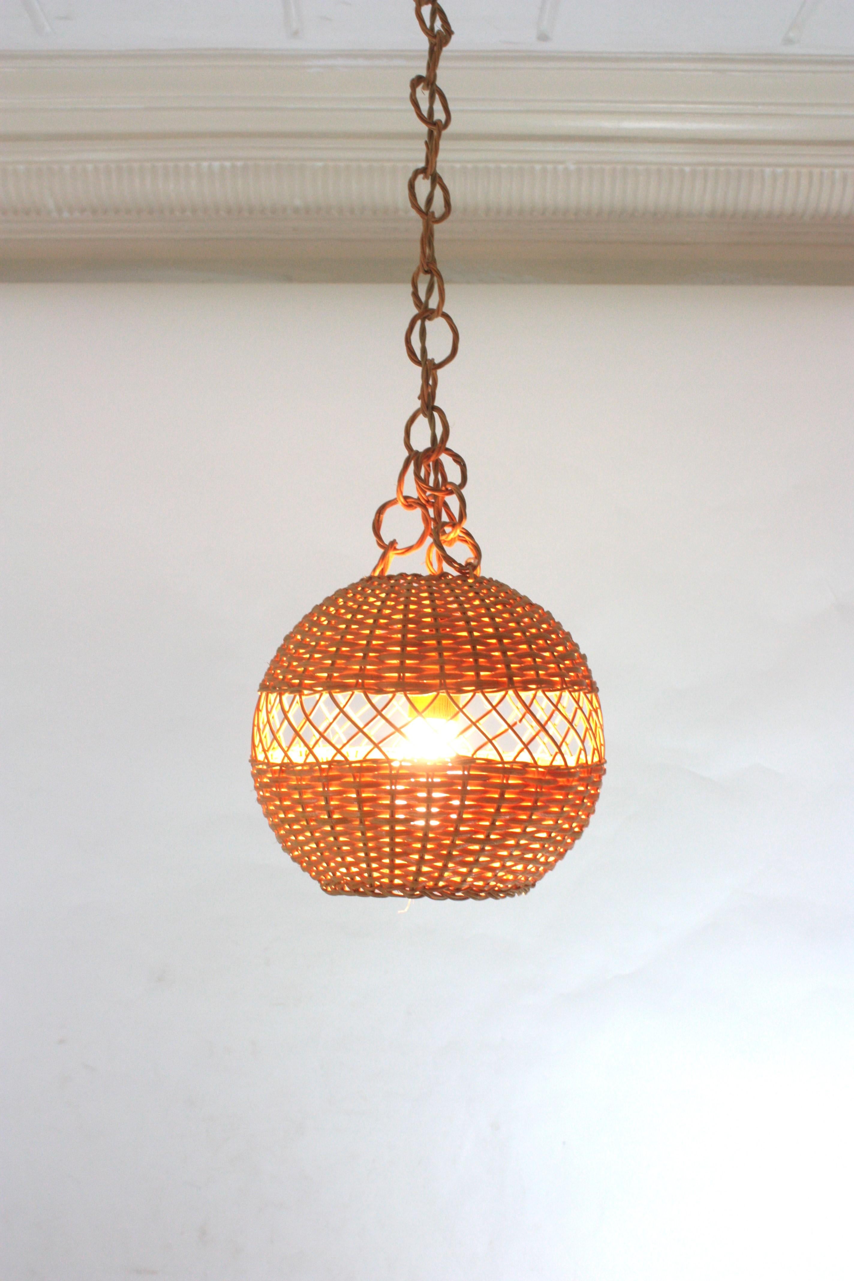 Pair of Handwoven Wicker Globe Pendant Lights or Lanterns For Sale 5