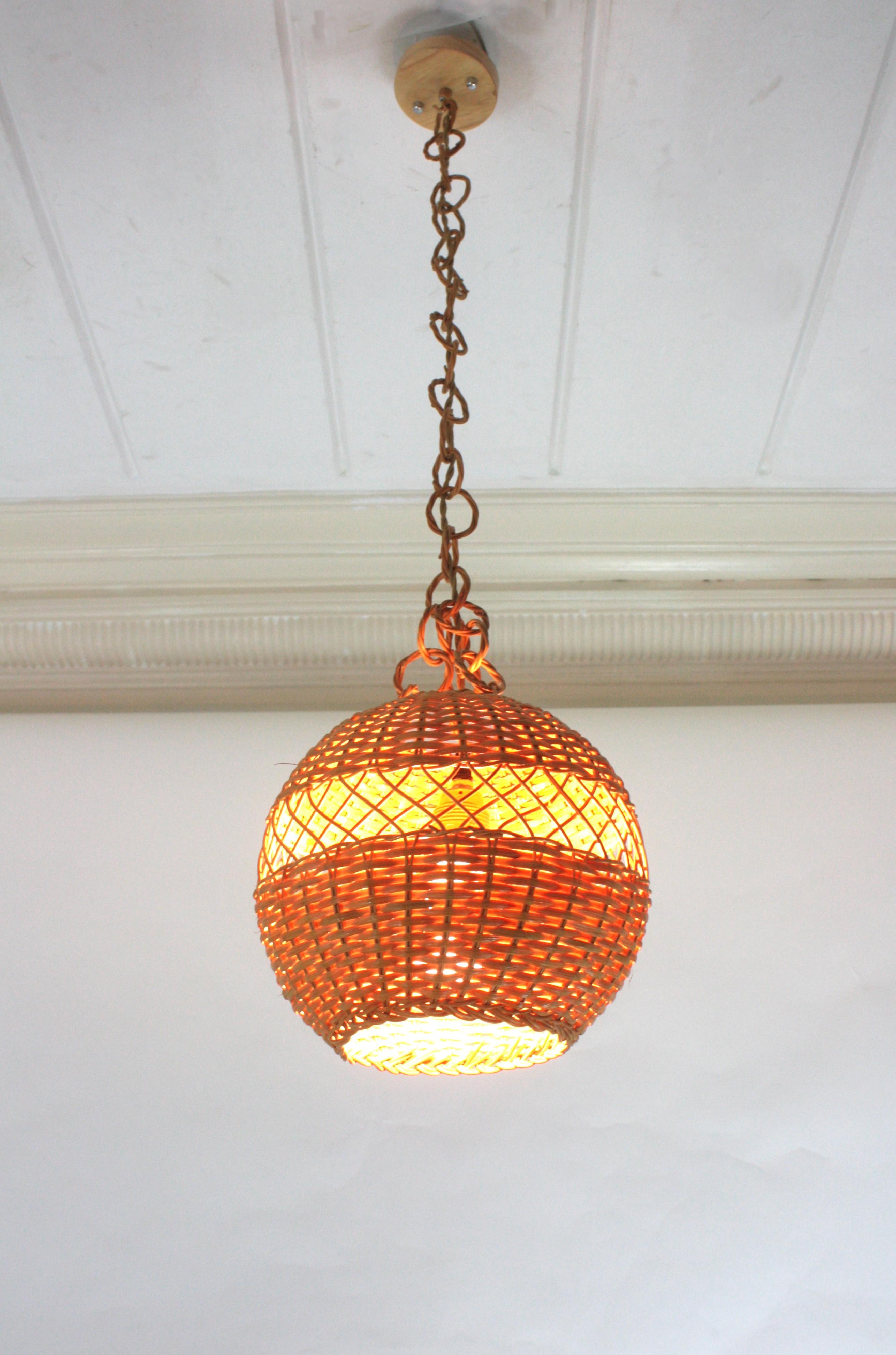 Pair of Handwoven Wicker Globe Pendant Lights or Lanterns For Sale 6