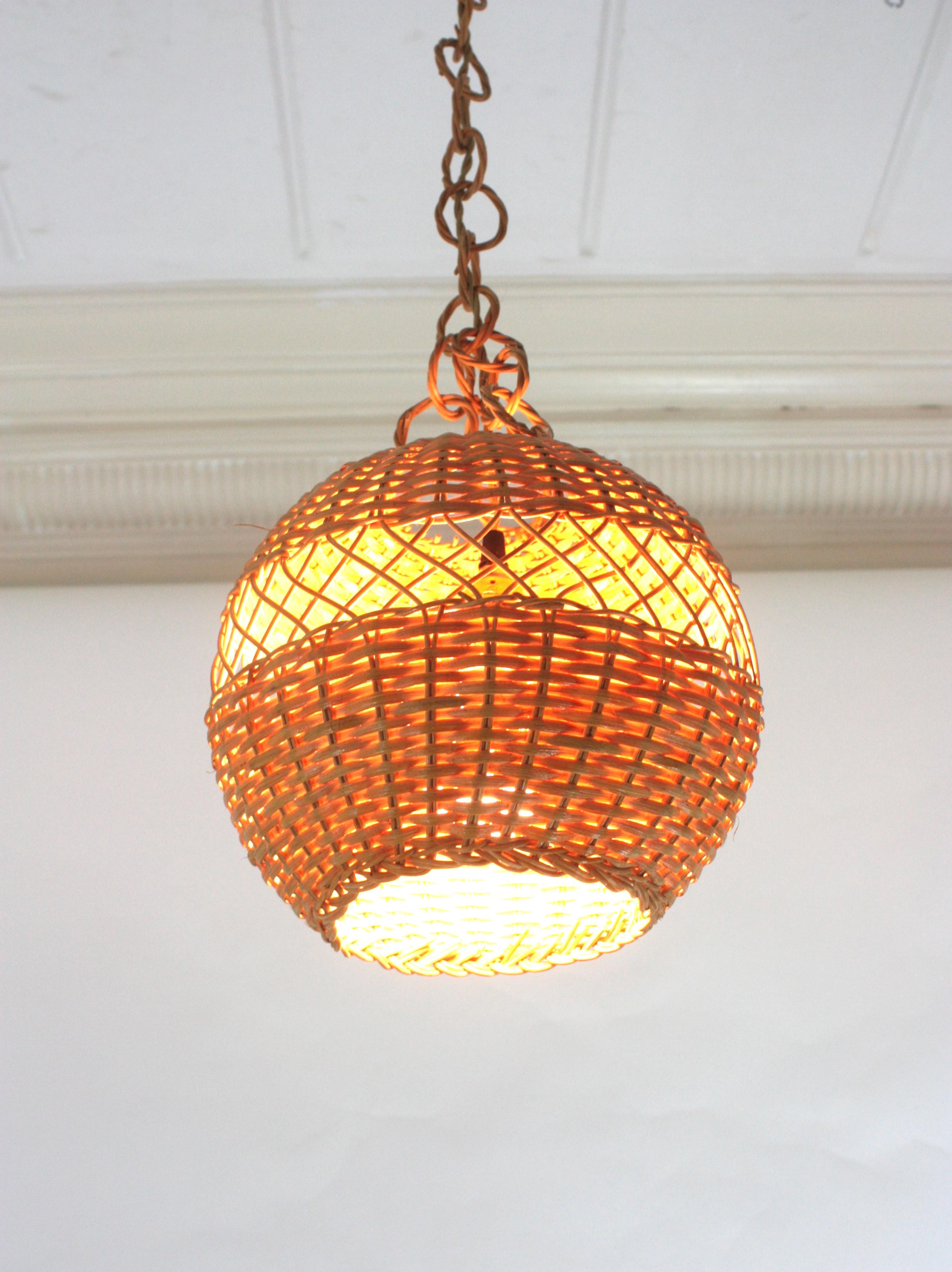 Pair of Handwoven Wicker Globe Pendant Lights or Lanterns For Sale 7