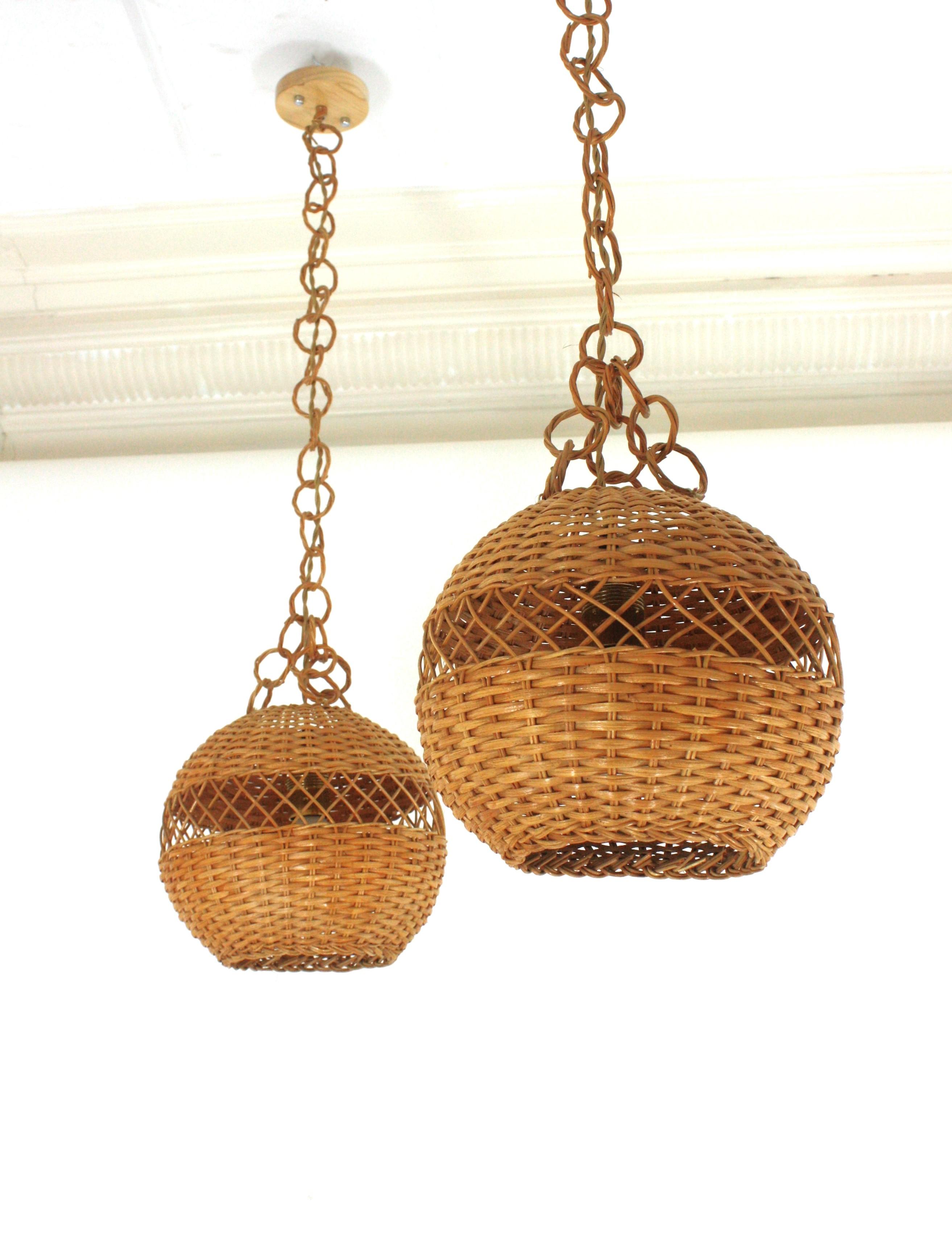 Spanish Pair of Handwoven Wicker Globe Pendant Lights or Lanterns For Sale